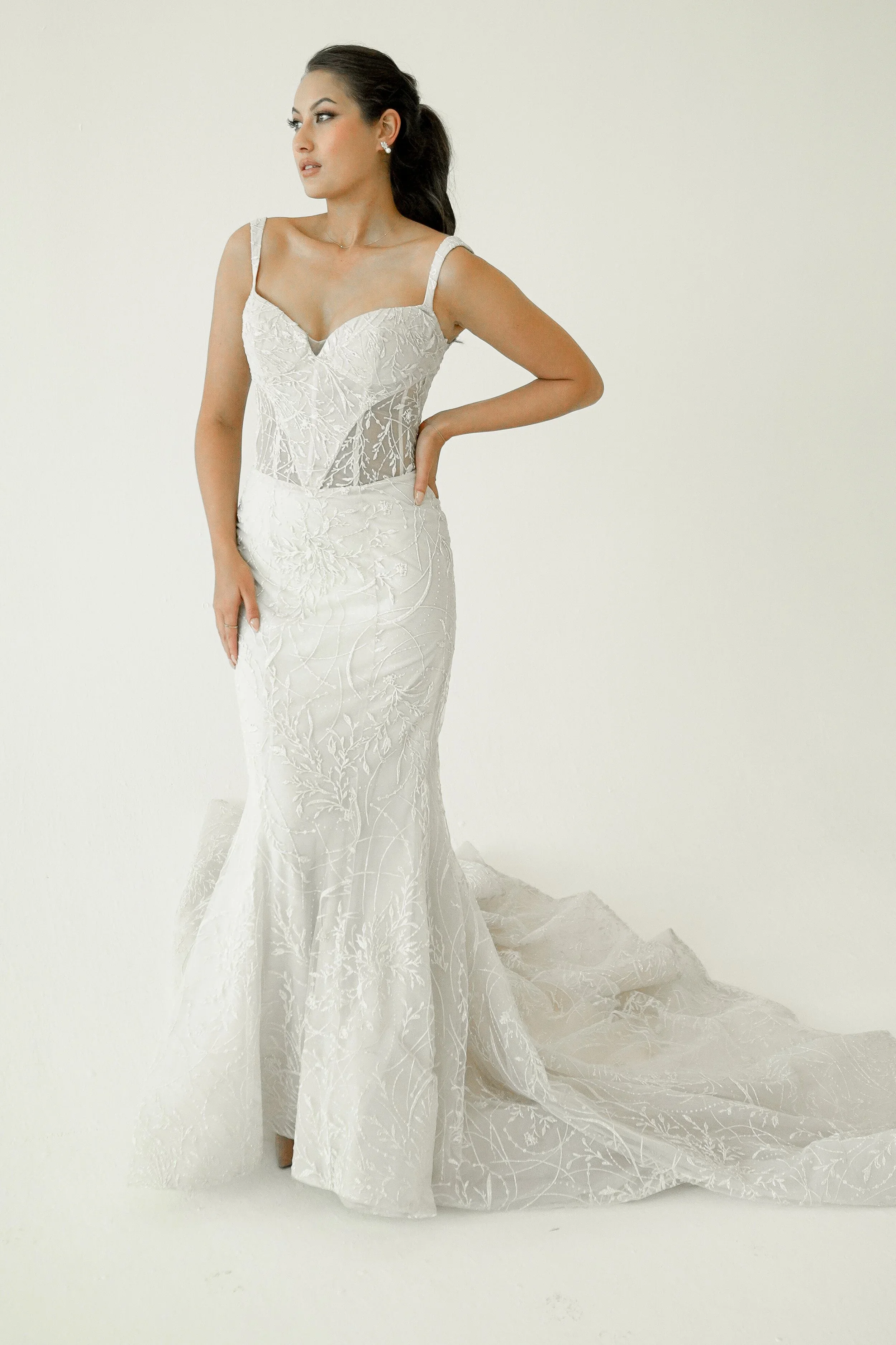 Elizabeth Lee Valentina romantic beaded lace mermaid wedding dress with tank straps, low scoop back, and long lace train.