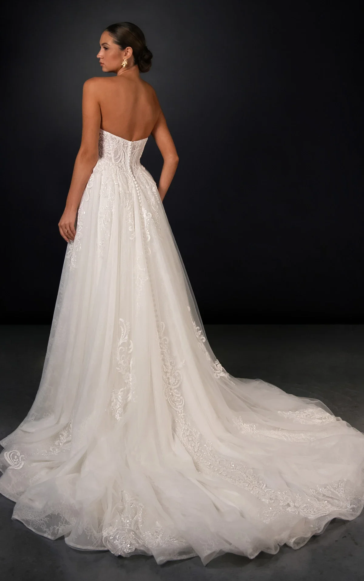 Martina Liana ML2040 couture wedding dress with structured bodice and elegant bridal silhouette at Bride To Be Couture Sacramento Back strapless.webp