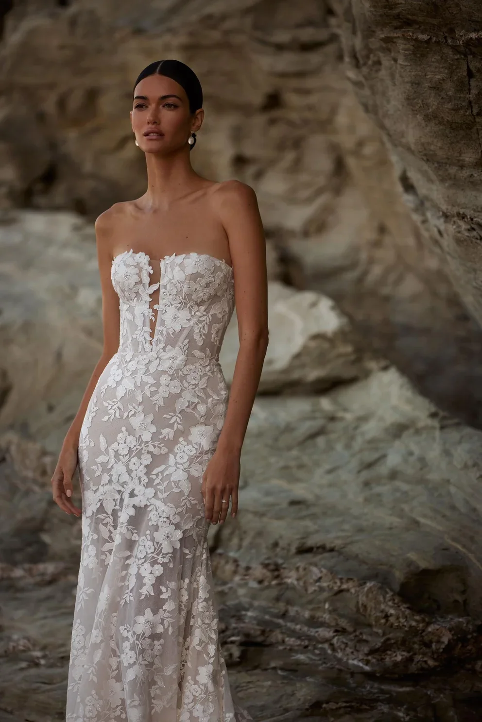 Dreamy sleeveless mermaid wedding gown fully embroidered with floral lace and sequins.