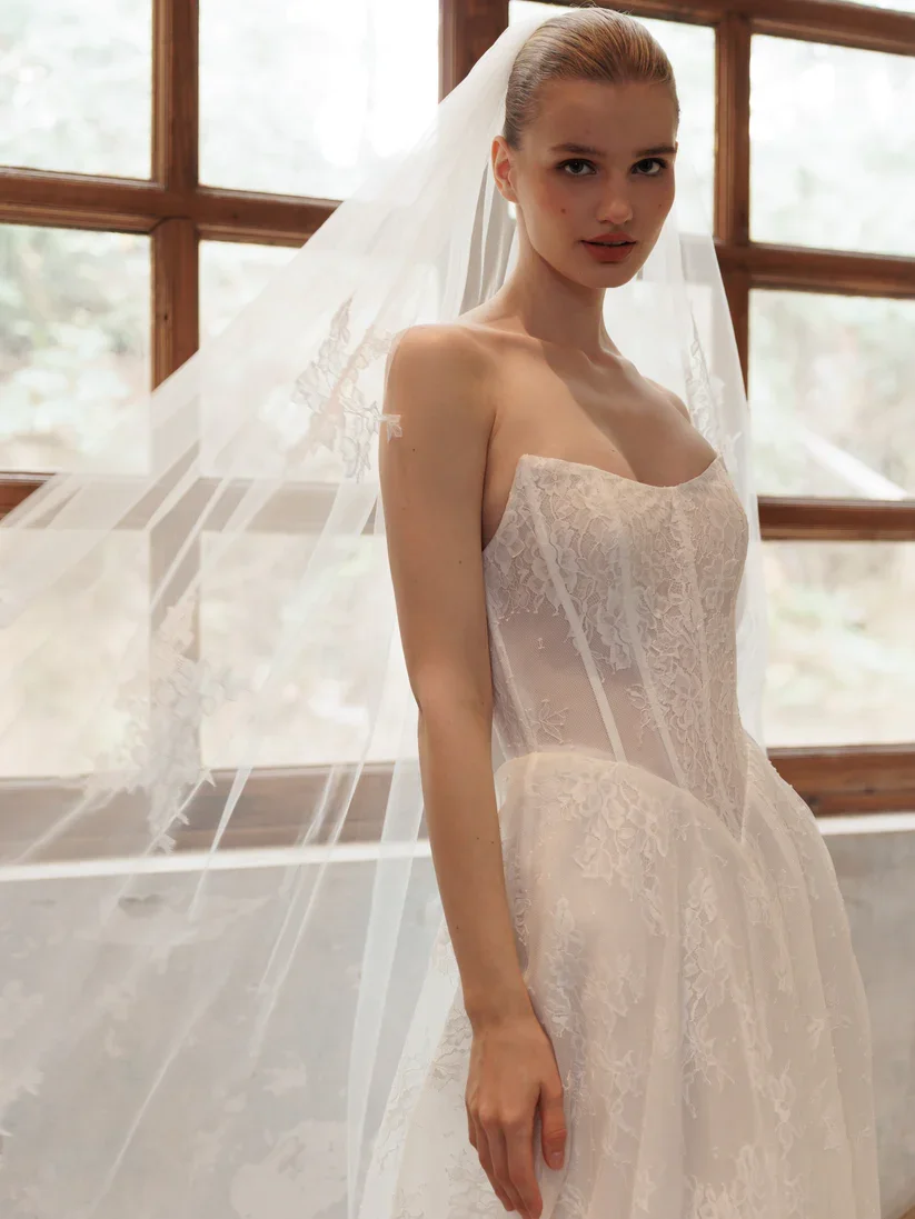 A-Line with basque waist and tulle alongside a long train and veil option