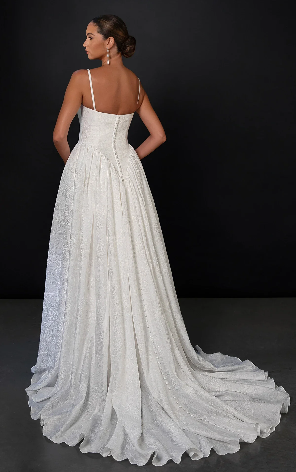 Martina Liana ML1998 spaghetti-strap A-line wedding gown in Organdy Jacquard with straight neckline, basque waist, and dramatic hip volume, available at Bride To Be Couture in Sacramento.