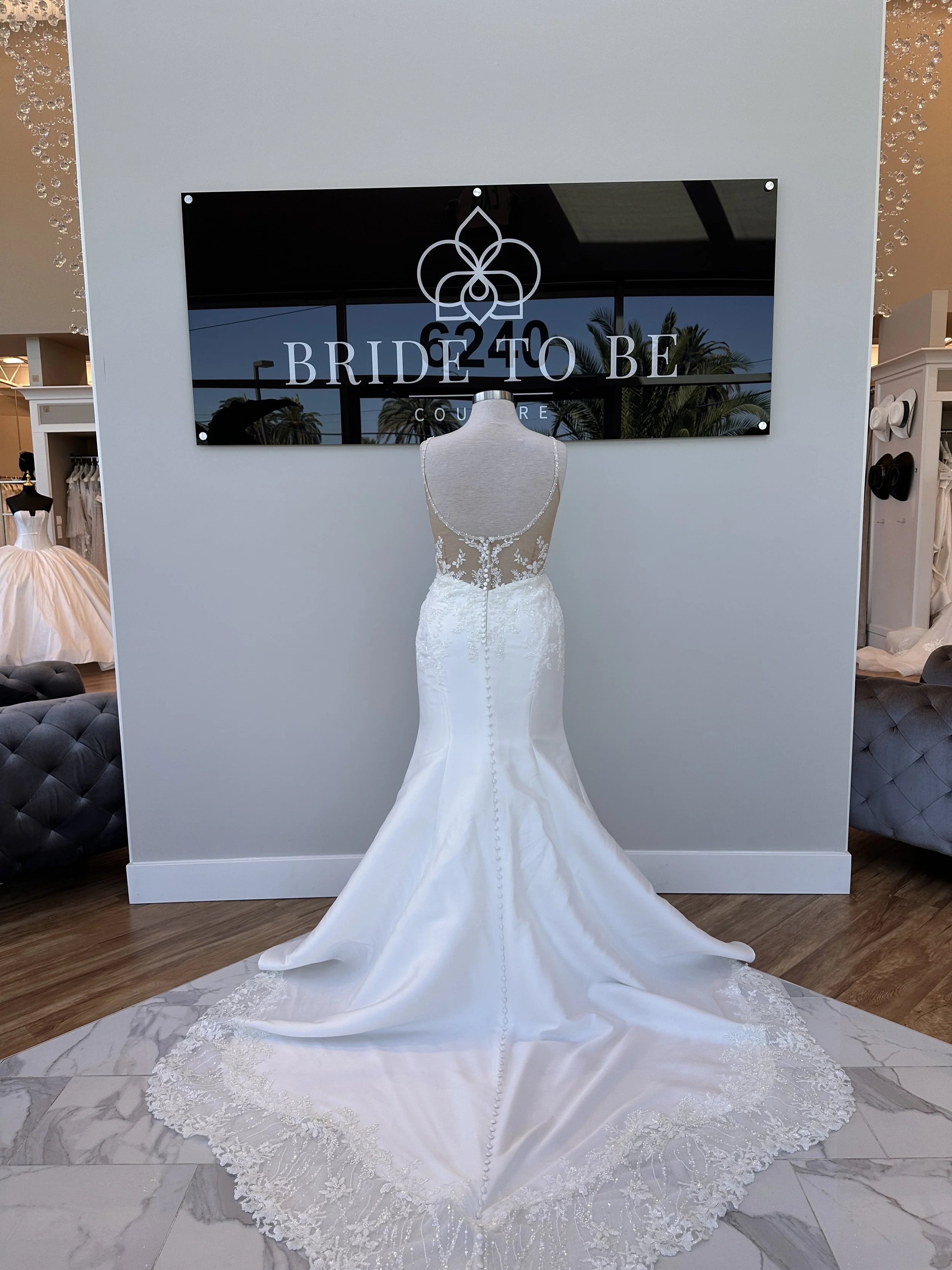 Legacy Eleanor wedding dress featuring a lace bodice, scoop neckline, and fitted satin silhouette at Bride To Be Couture in Sacramento.
