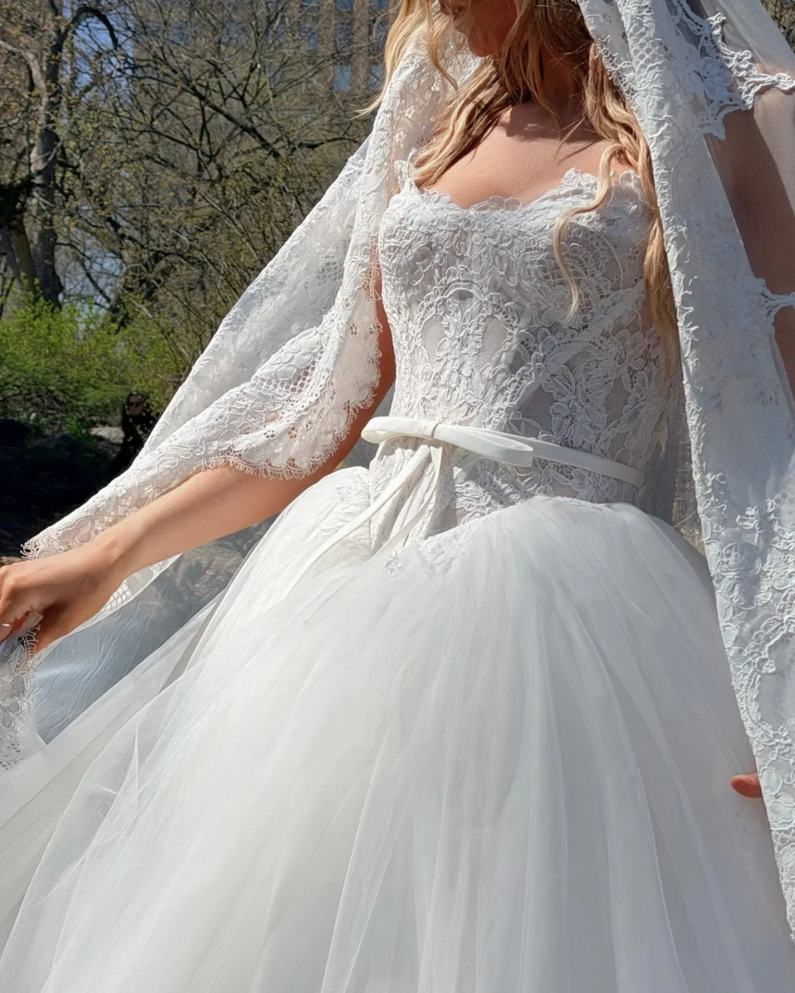 Ivory Alencon lace and tulle ballgown, scalloped strapless neckline with bias trim corset detail, basque waistline