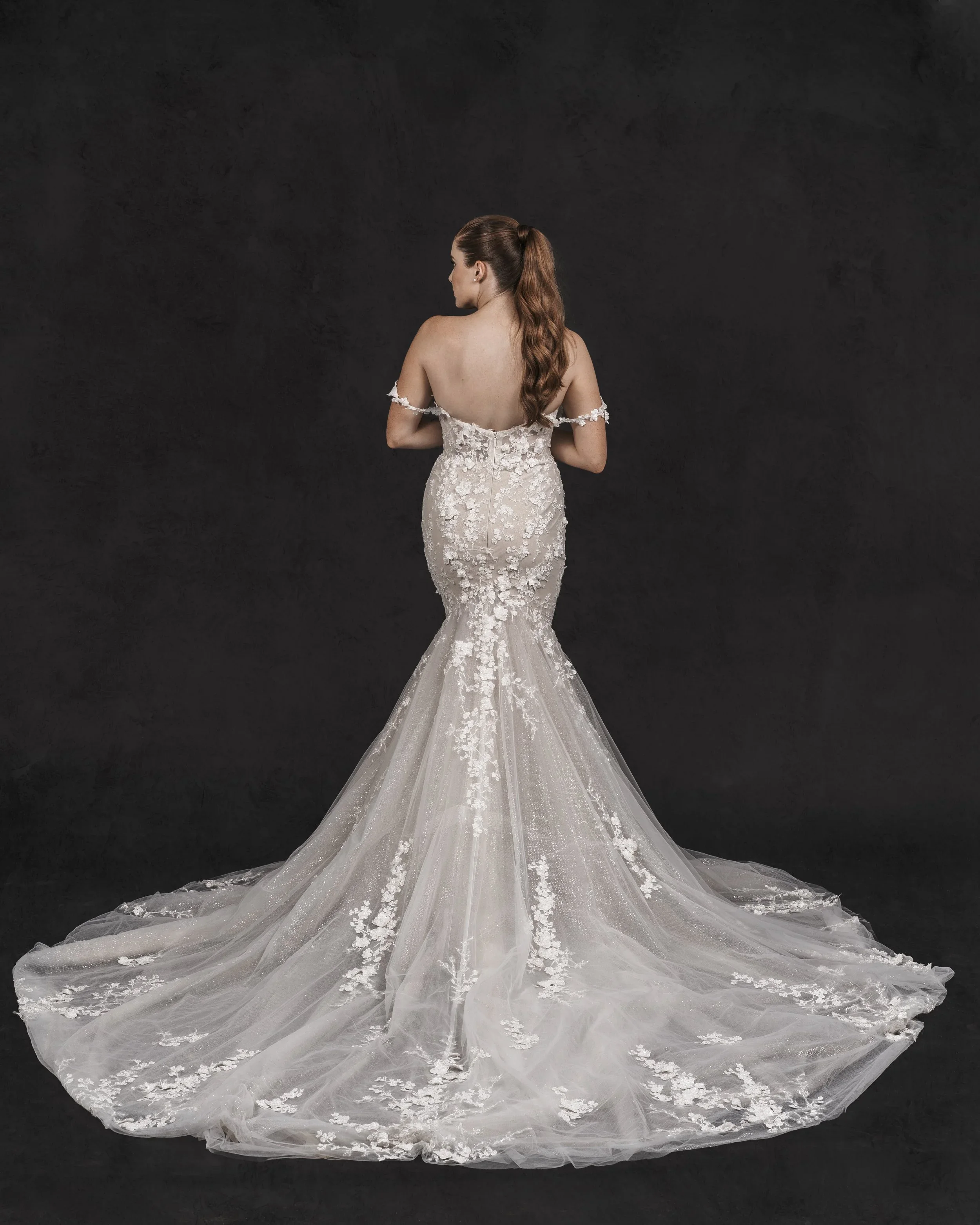 Elizabeth Lee Ardi stunning mermaid wedding dress with Israeli floral 3D lace appliqués and detachable Juliet straps.