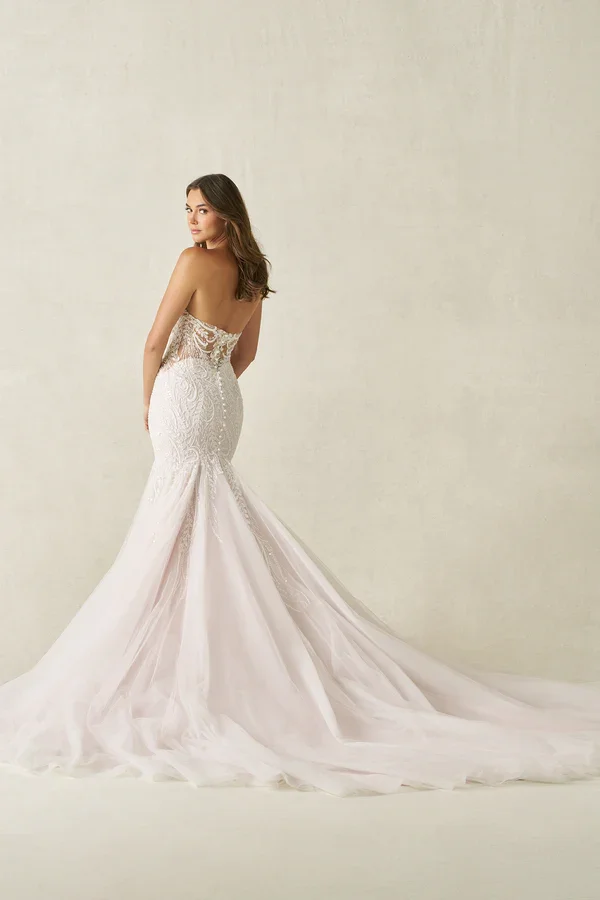 strapless fit-and-flare wedding gown with sweetheart neckline, swirling lace bodice, beaded and pearl accents, and sparkle tulle skirt