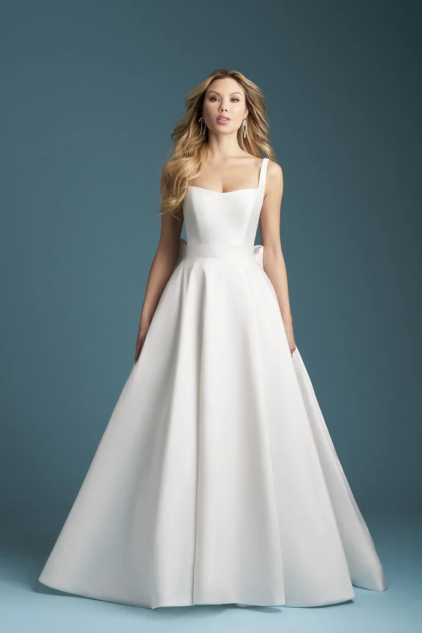 Allure Bridals A1353 Mikado ballgown wedding dress with classic scoop neckline, delicate spaghetti straps, and a detachable bow at the back.