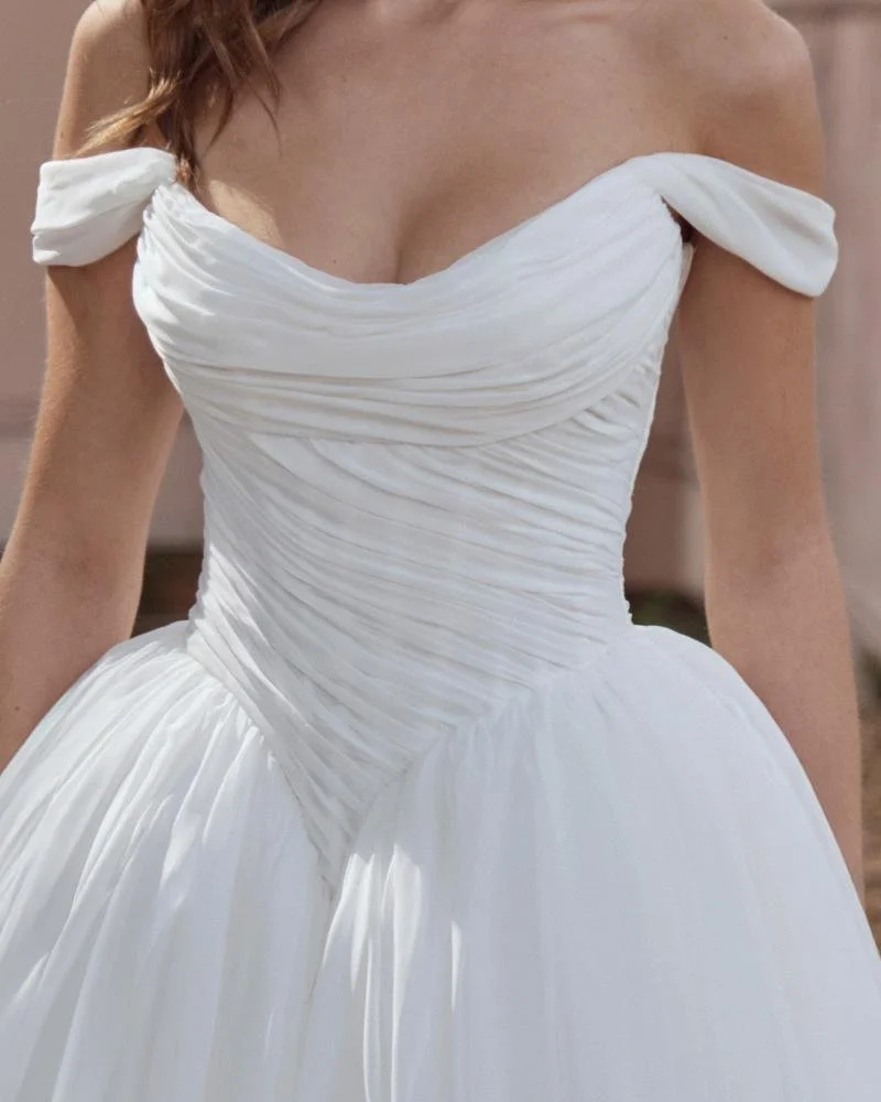 L'Amour Clover LA26240 chiffon tulle ballgown with deep basque waist and off-the-shoulder straps.
