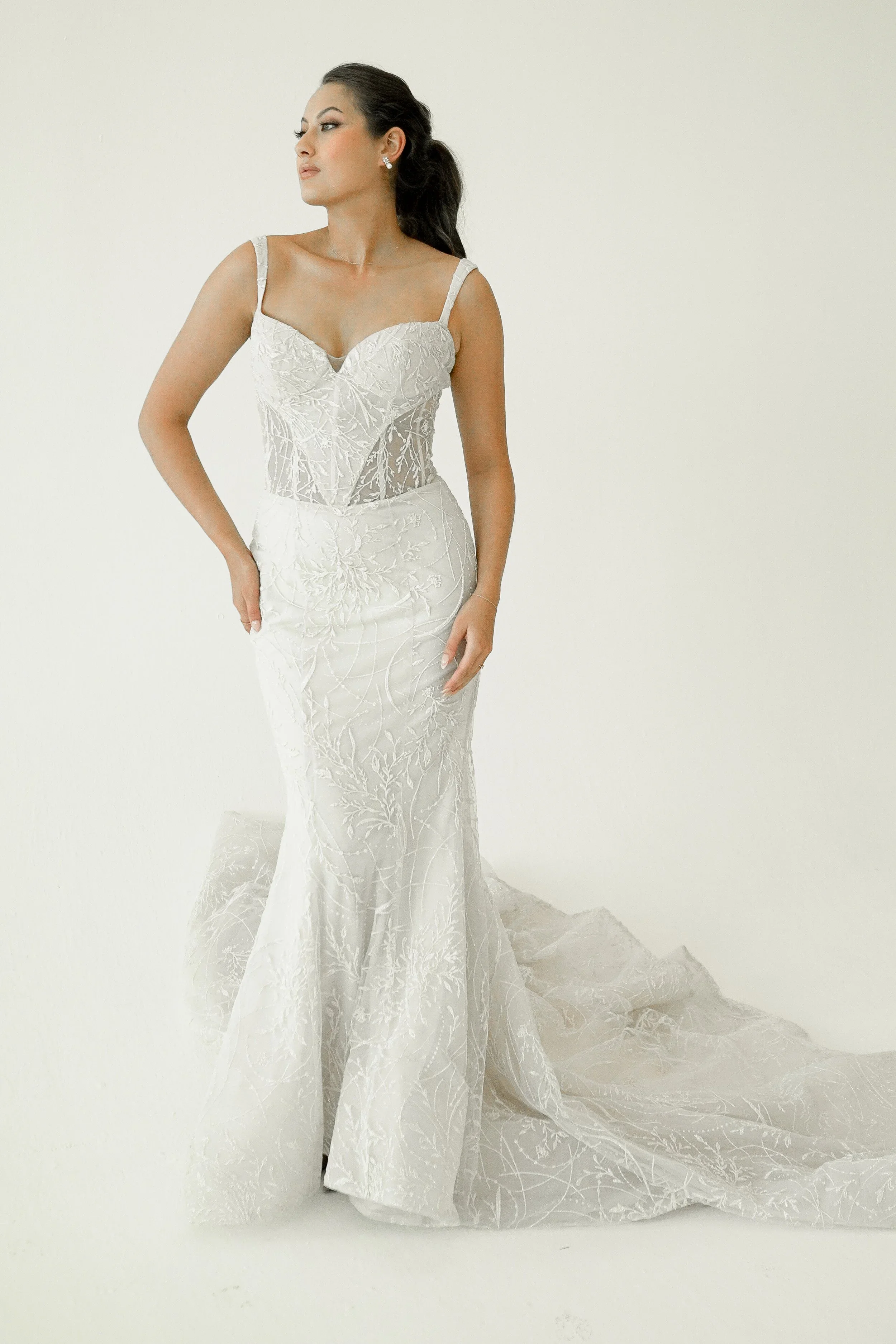 Elizabeth Lee Valentina romantic beaded lace mermaid wedding dress with tank straps, low scoop back, and long lace train.