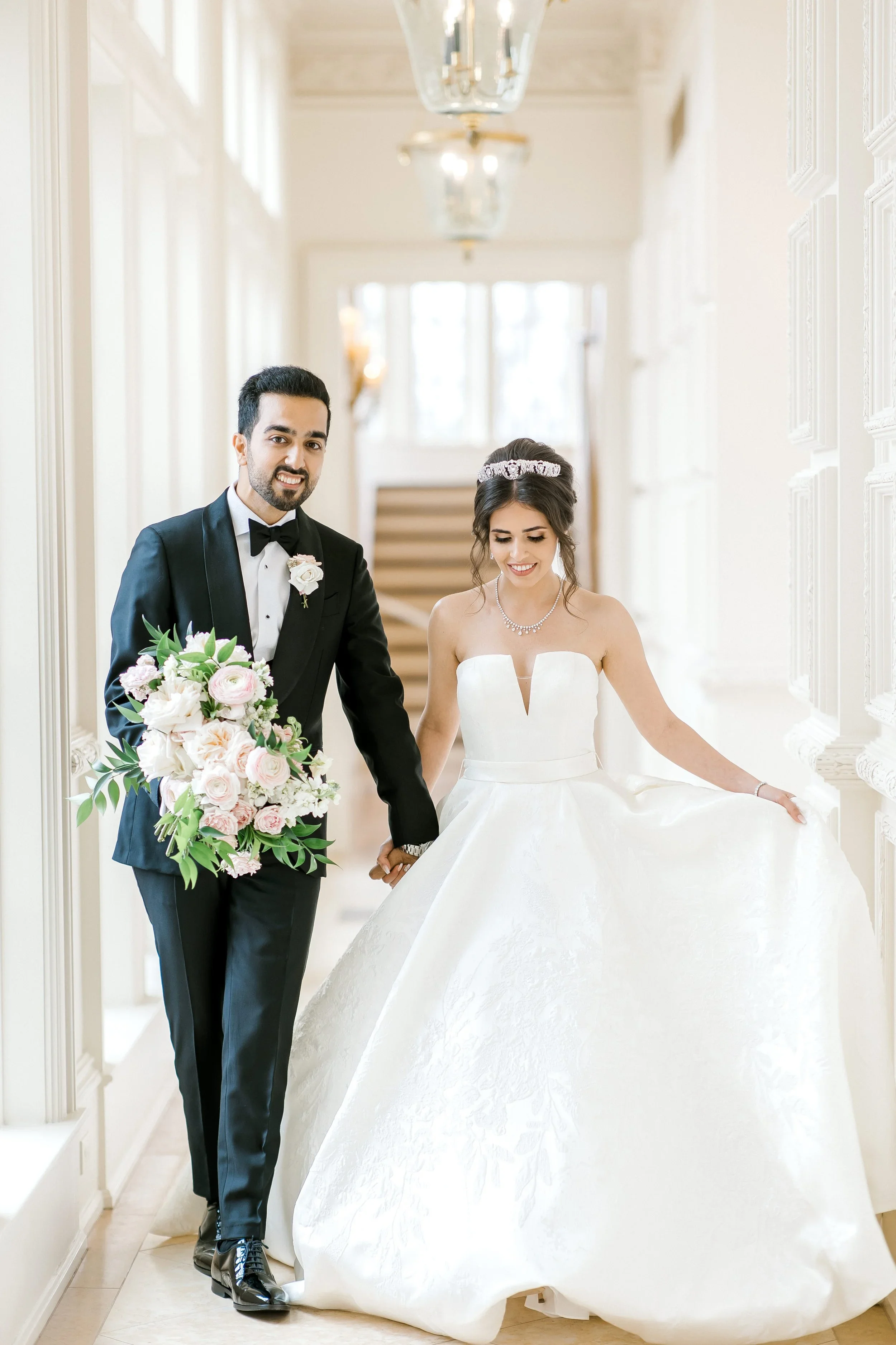 Elizabeth Lee Francesca luxurious Italian lace ballgown wedding dress with modern plunge neckline.