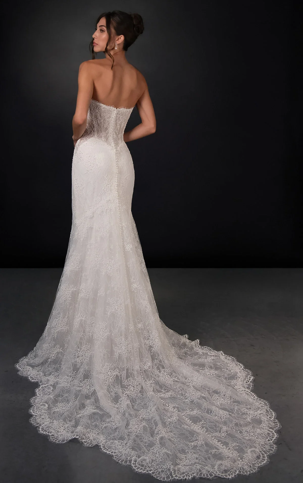 Martina Liana ML2010 lace fit-and-flare wedding dress with sweetheart corset bodice and detachable lace capelet at Bride To Be Couture Sacramento Back.webp
