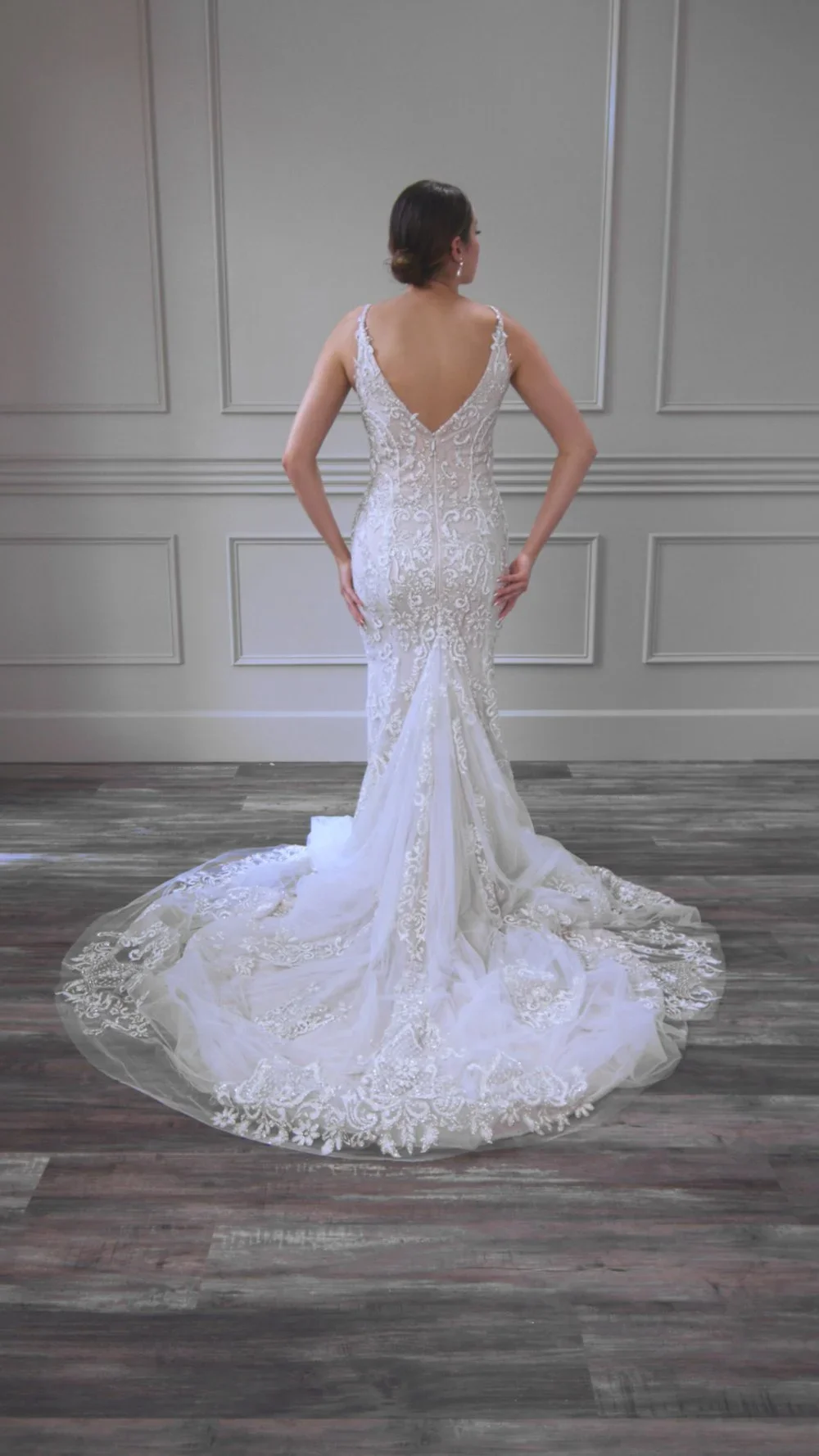 Elizabeth Lee Melissa sparkling Israeli lace fit-and-flare wedding dress with plunging illusion neckline.