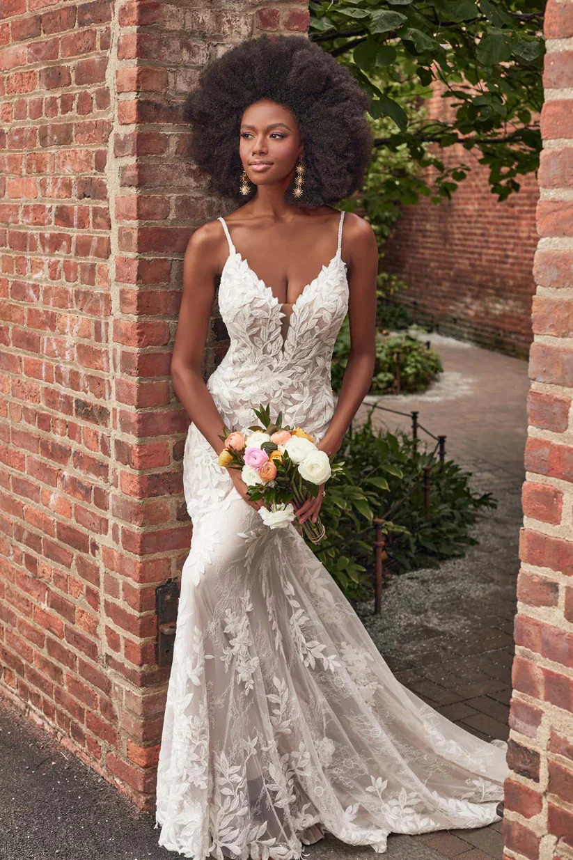 Madison James Jordan strappy lace sheath wedding dress with nature-inspired leaf and branch appliques across the bodice.