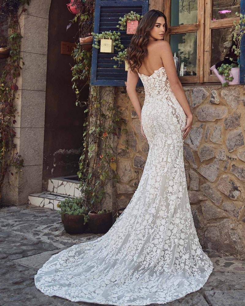 Calla Blanche Jovienne 125246 strapless semi-sweetheart sheath wedding dress with sheer corset bodice, floral 3D lace, side illusions, and detachable off-the-shoulder sleeves.