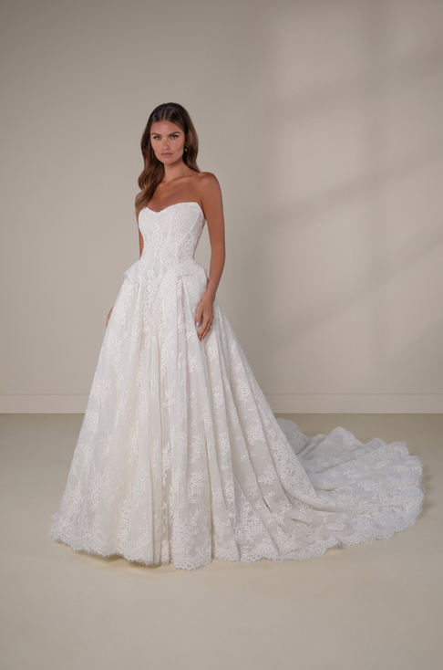 Martina Liana Luxe LE1435 strapless sweetheart couture ballgown in Chantilly lace with corset boning, drop waist, and faux peplum detail, available at Bride To Be Couture in Sacramento.