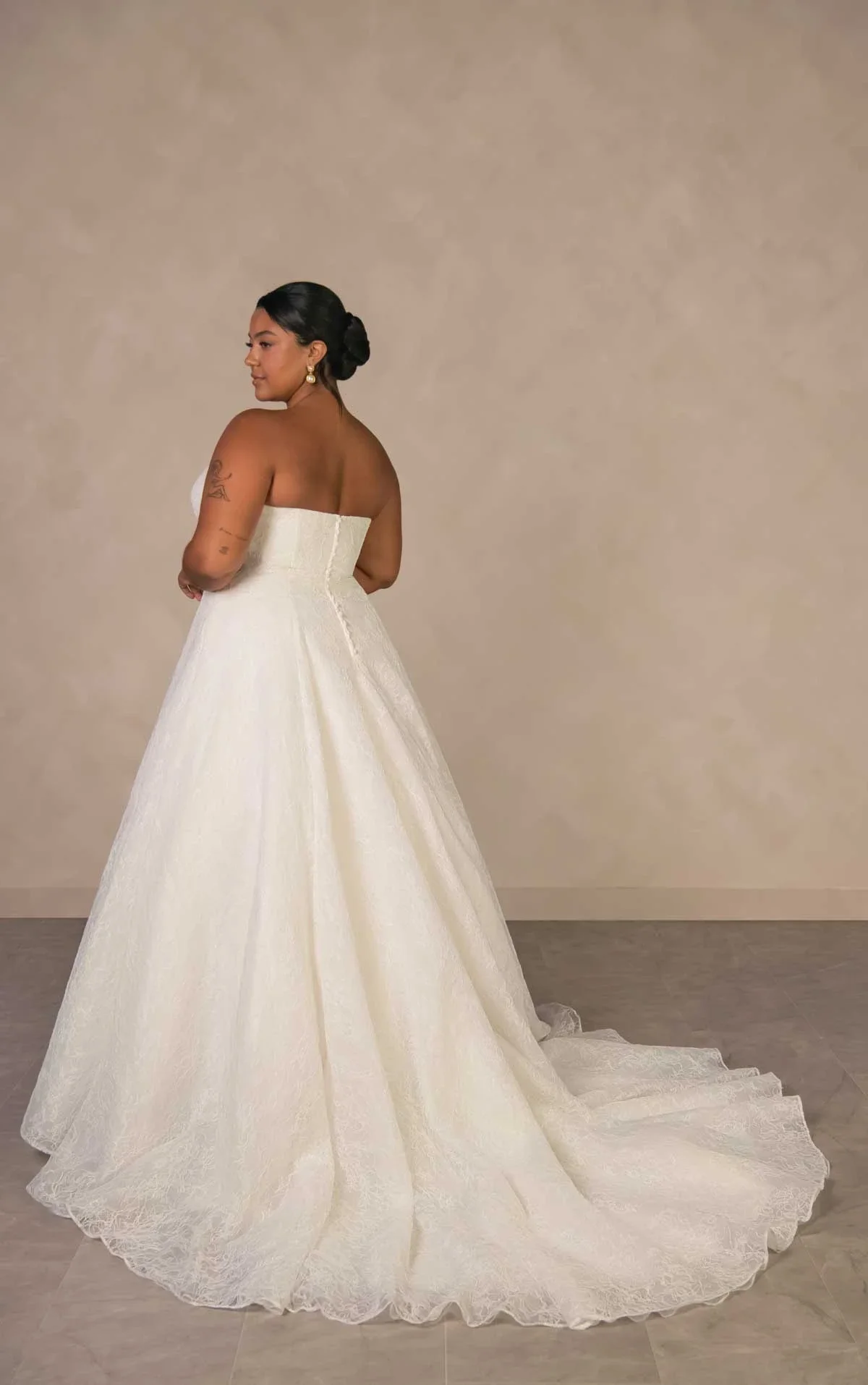 Essense of Australia D4543 timeless strapless sweetheart plus-size A-line wedding gown in allover corded floral lace with drop waist and sweeping lace train