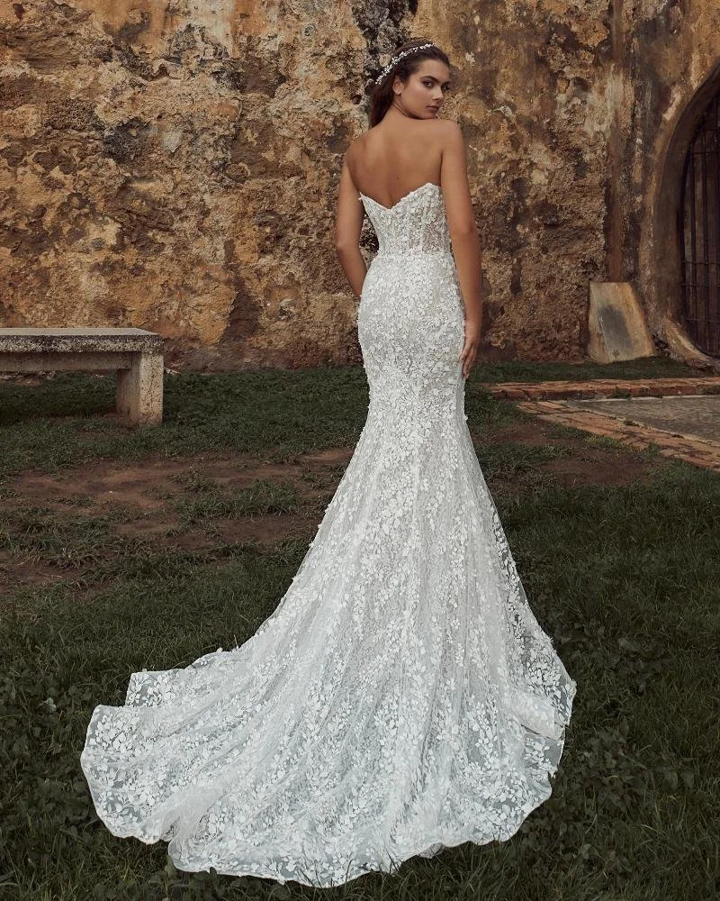 Calla Blanche Elmira 123117 versatile strapless sheath wedding dress with sweetheart neckline, 3D lace, optional detachable long puff sleeves, and tulle overskirt.