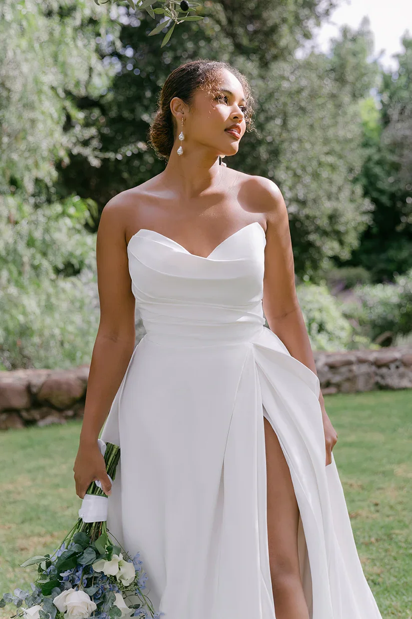 Madison James Larissa classic A-line wedding gown with statuesque strapless sweetheart bodice and dramatic front slit.