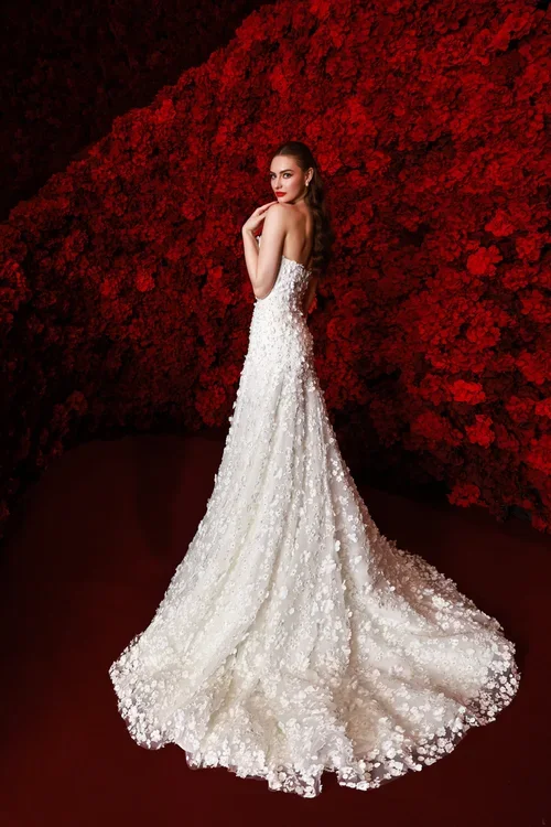 Dany Tabet Kirsi DT0025W491 romantic 3D floral lace A-line wedding dress with strapless sweetheart neckline, sweep train, and matching floral veil.