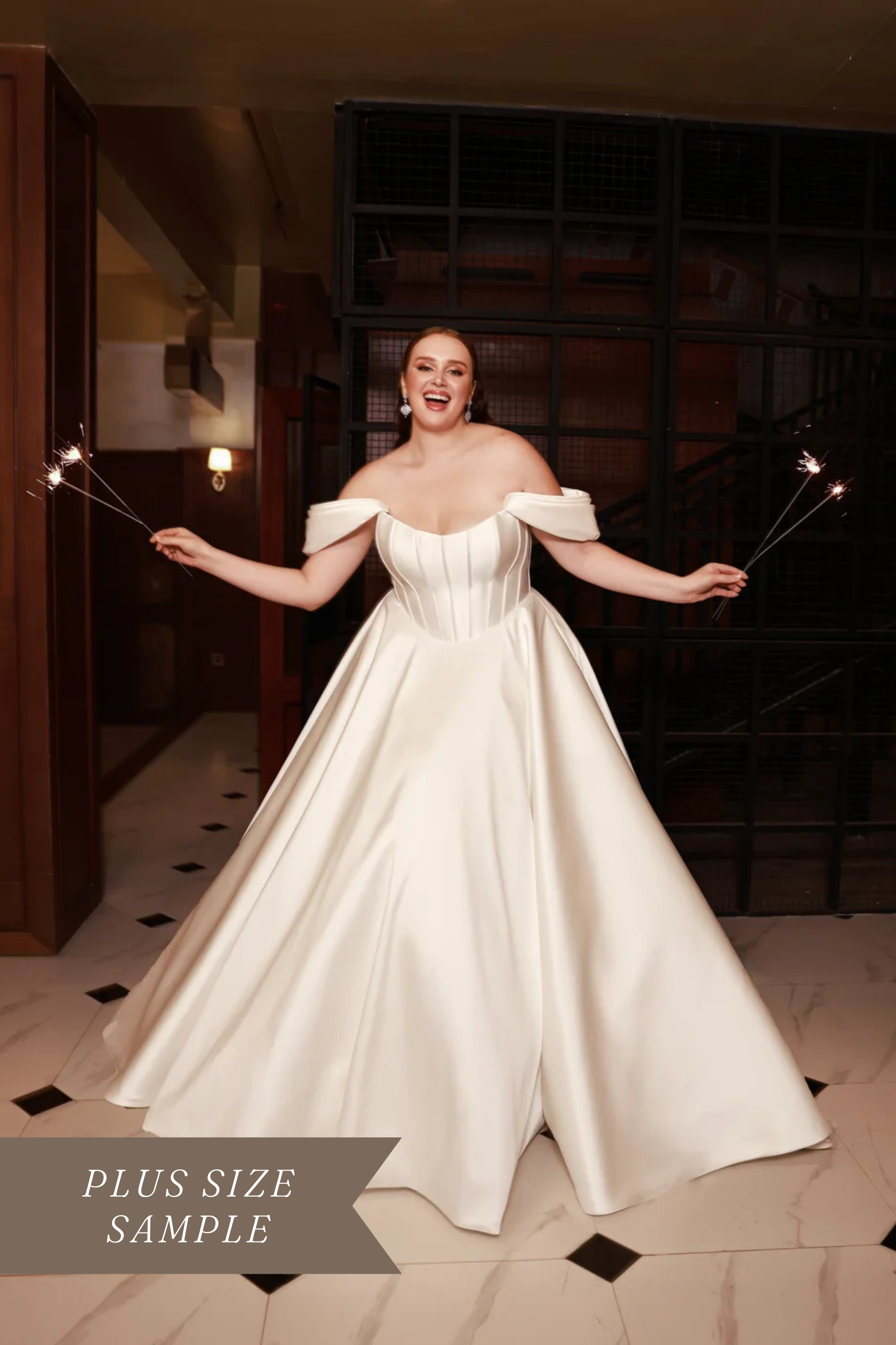 Dany Tabet Beckett DG0025W422 plus size off-the-shoulder sweetheart satin ballgown wedding dress with exposed boning corset bodice and dramatic sweep skirt.