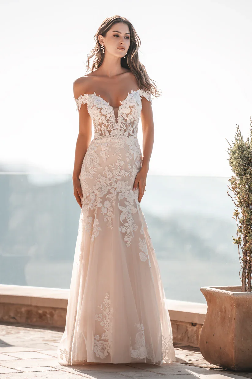 Allure Bridals A1202 romantic off-the-shoulder mermaid wedding gown with floral lace, sparkling tulle, and soft pearl beading throughout.