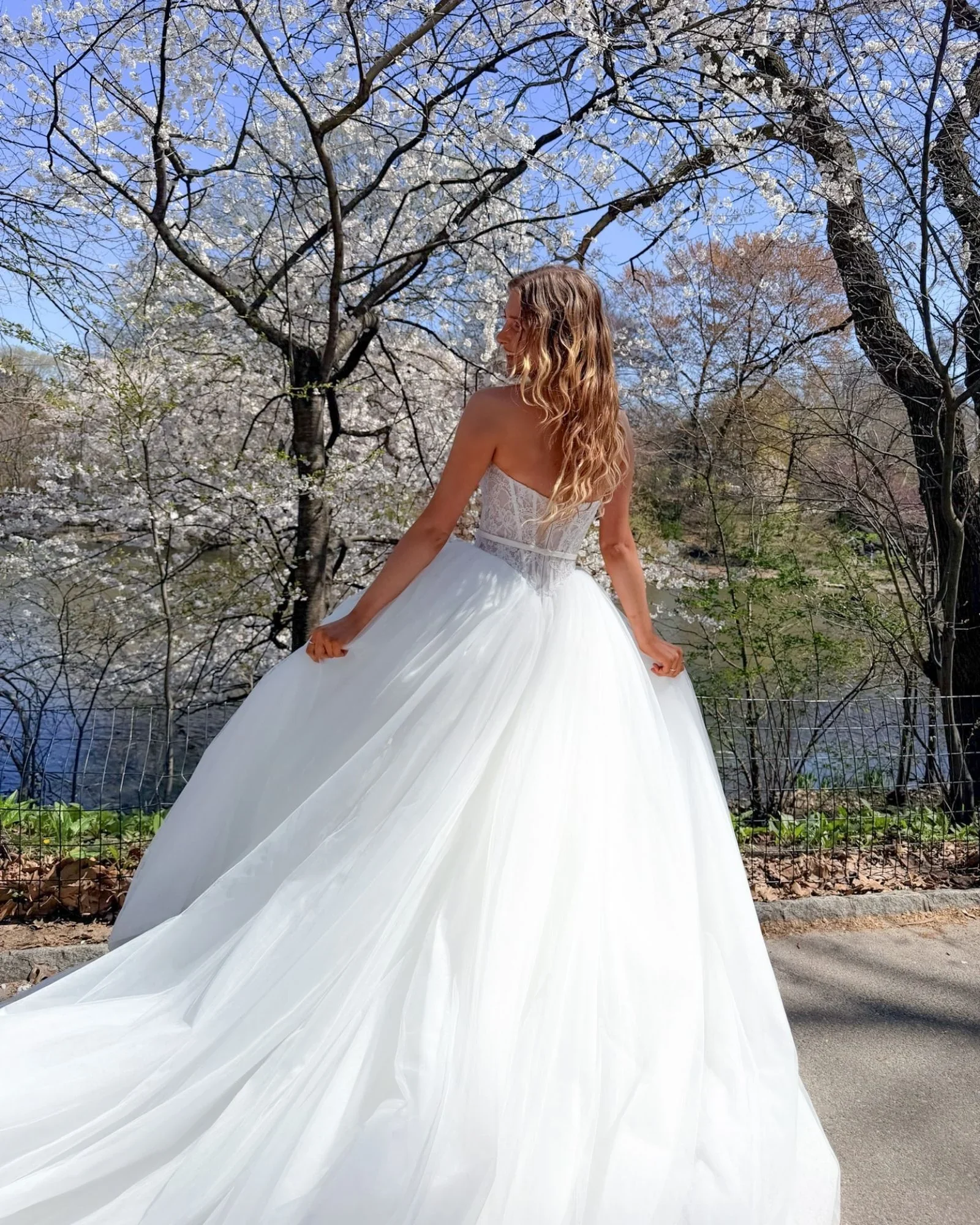 Ivory Alencon lace and tulle ballgown, scalloped strapless neckline with bias trim corset detail, basque waistline