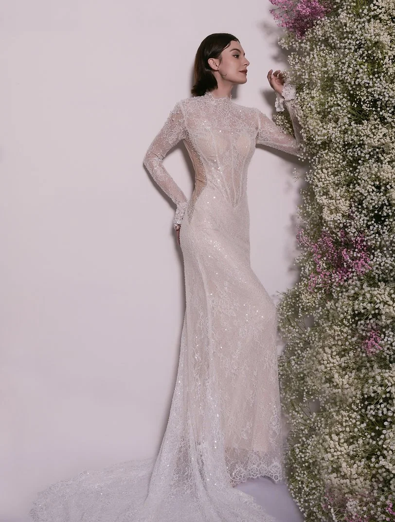 Luxe Long-Sleeve Lace Gown With Shimmering Detail, Sculpted Bodice and a Dramatic Train.