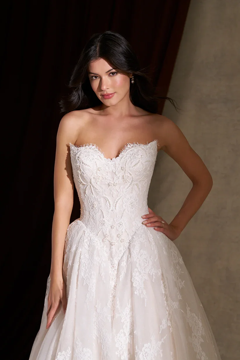 Allure Couture C845 ballgown with deep basque waist and lace, long train, cat-eye neckline, and sweetheart