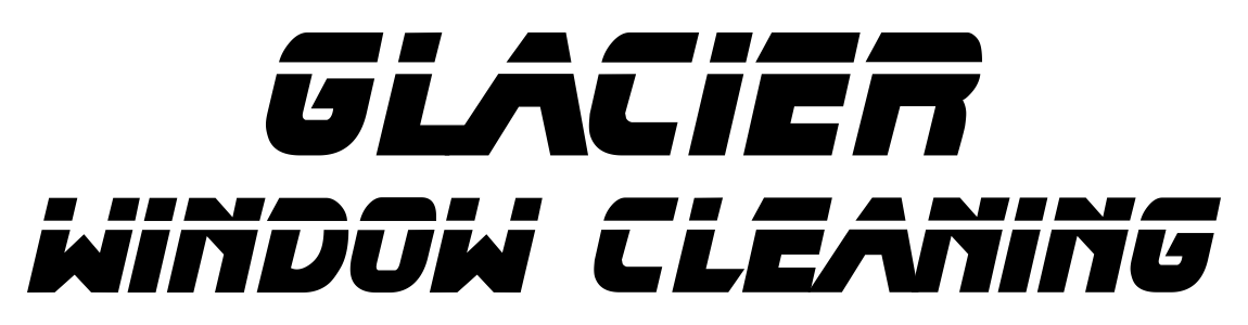 Black and white photograph of a city skyline with tall buildings and water in the foreground.