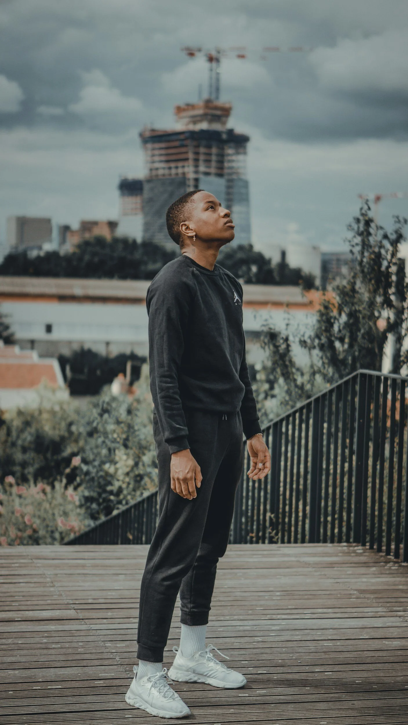 a person standing looking at a far distance