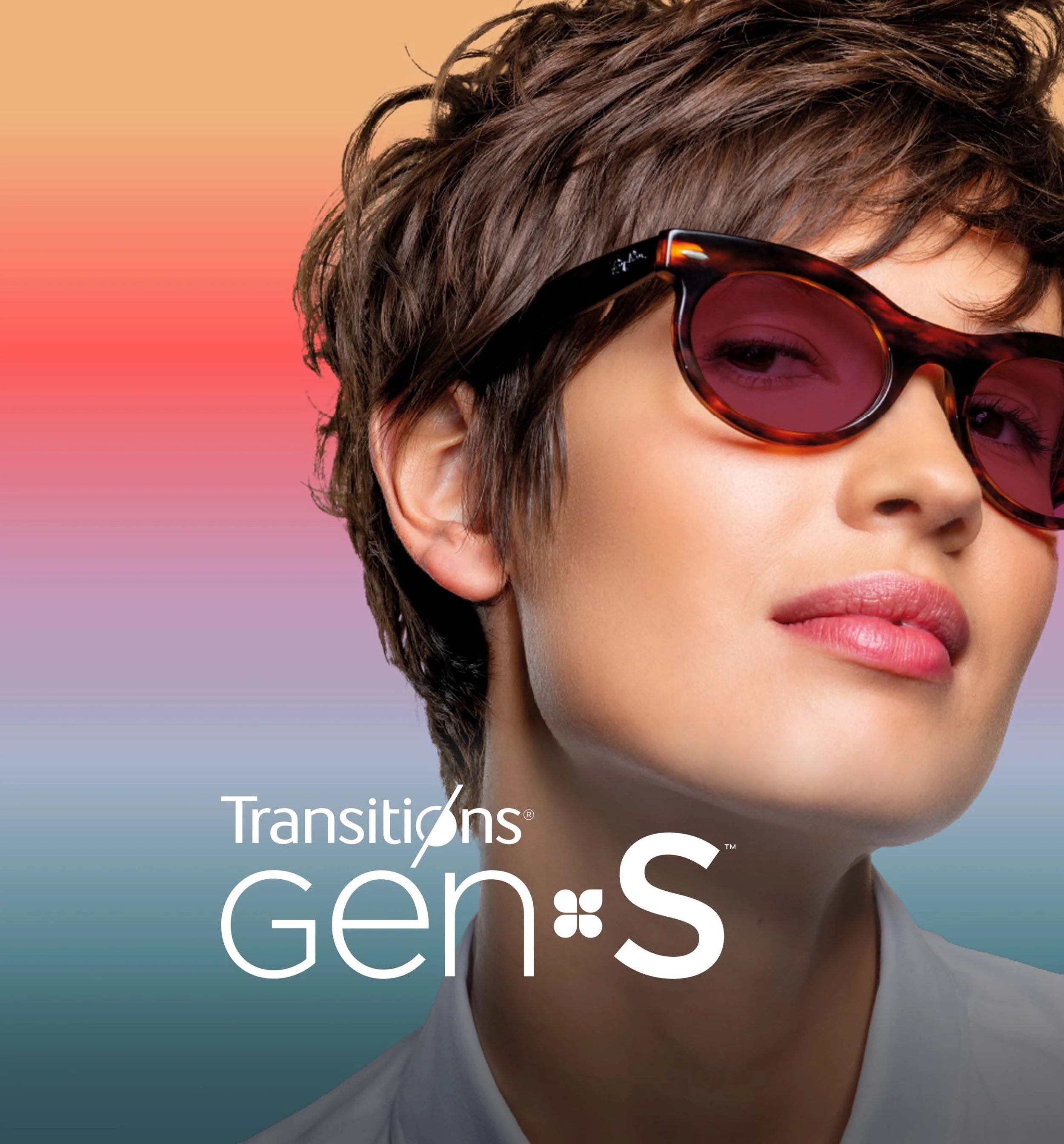 picture of a woman with a pair of glasses on showing the tint of transitions