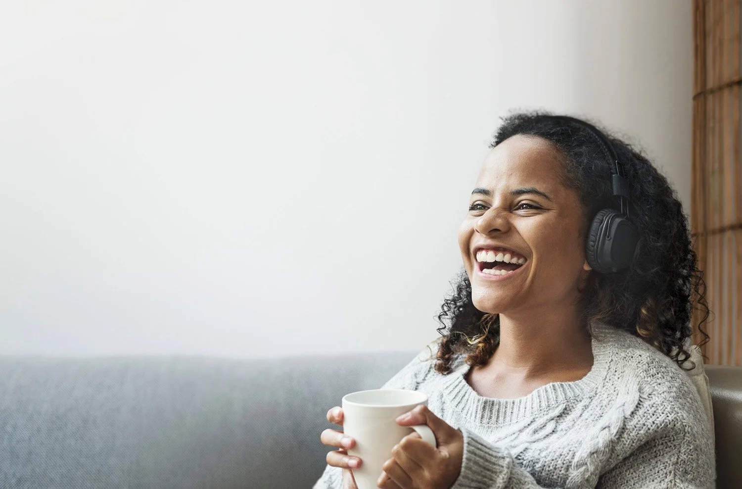 woman sitting on couch