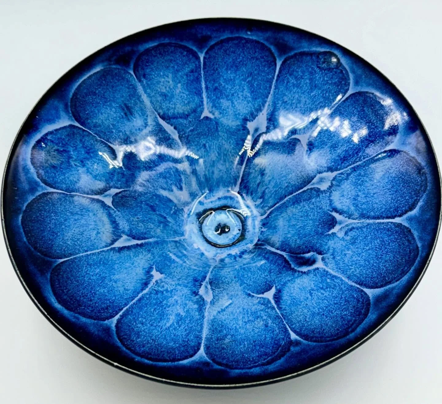 &ldquo;Blue Peacock&rdquo; 
Pretty cool piece, one of my best glazed this year. I&rsquo;m going to work on producing a collection of pieces similar to this next semester.