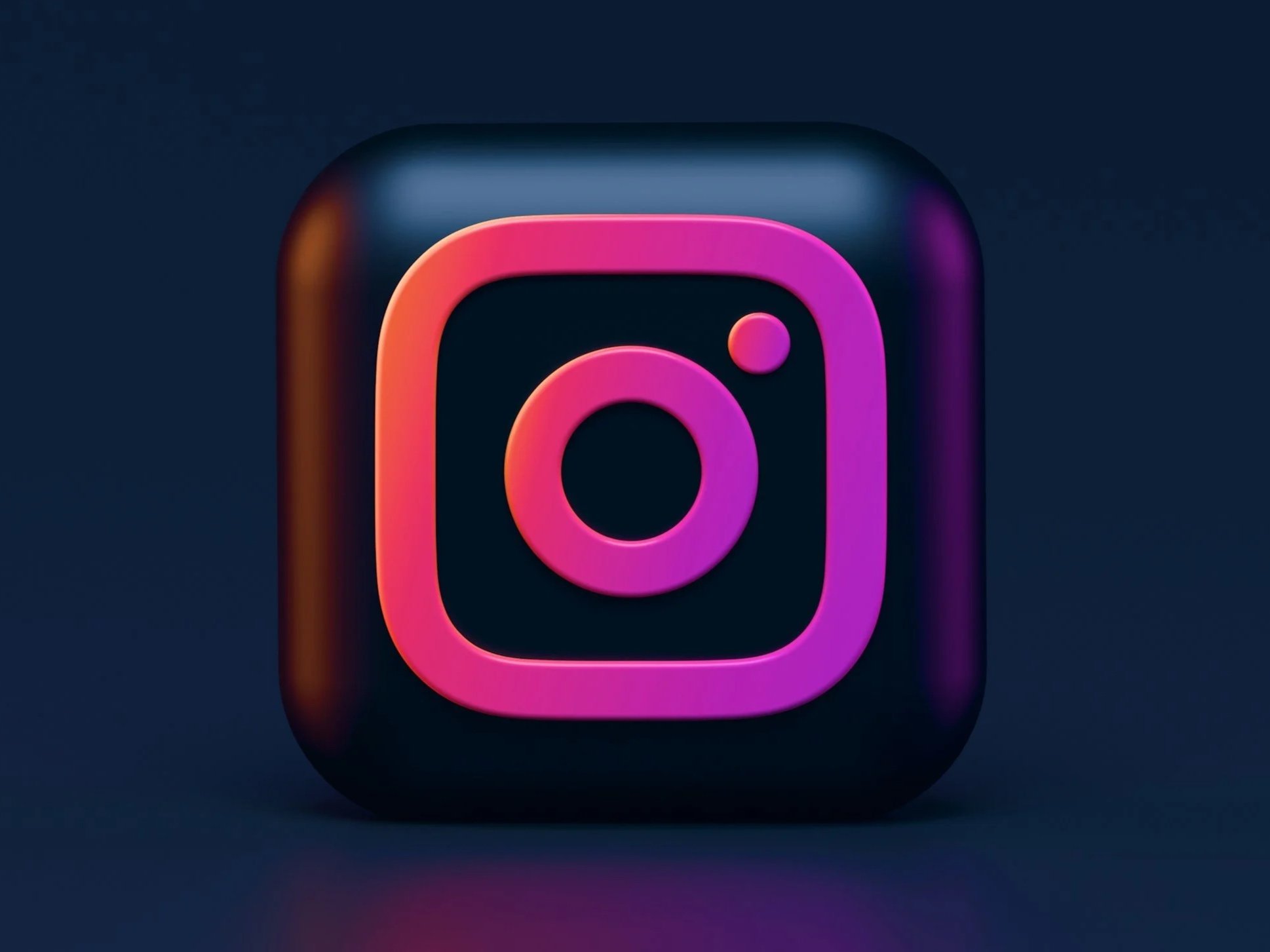 3D illustration of the Instagram app icon with a black background and glowing pink and purple edges.