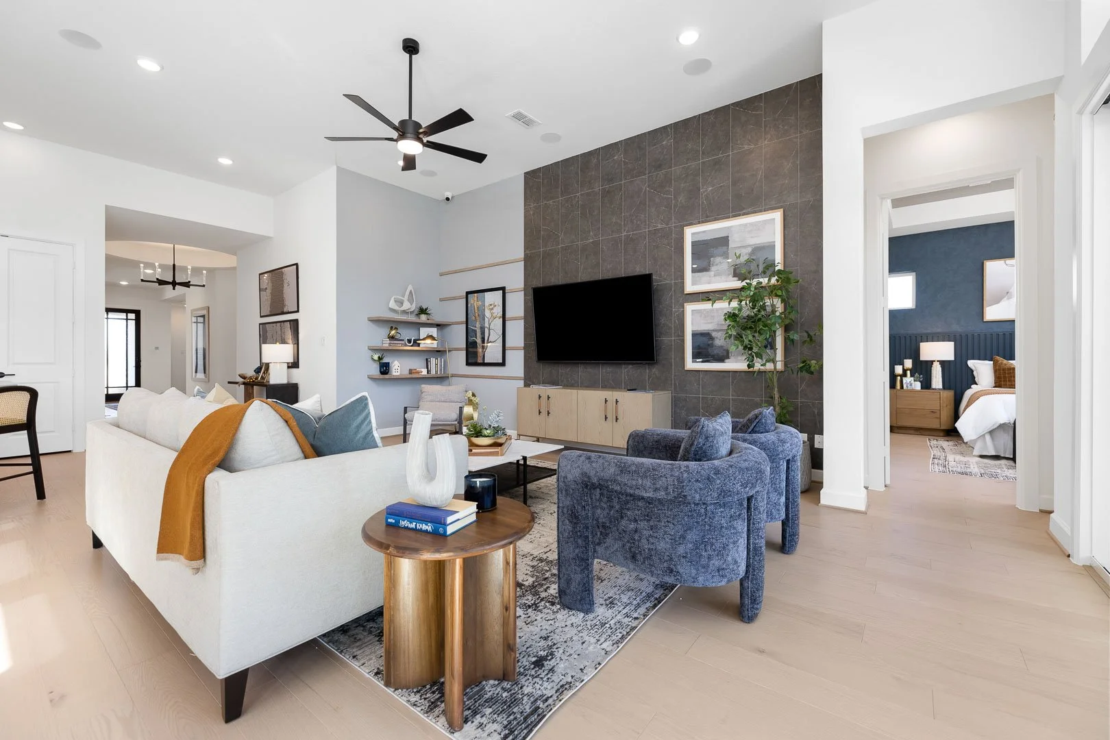 manvel-houston-tx-model-home-new-construction-open-concept-luxury-living-room-common-area.jpg