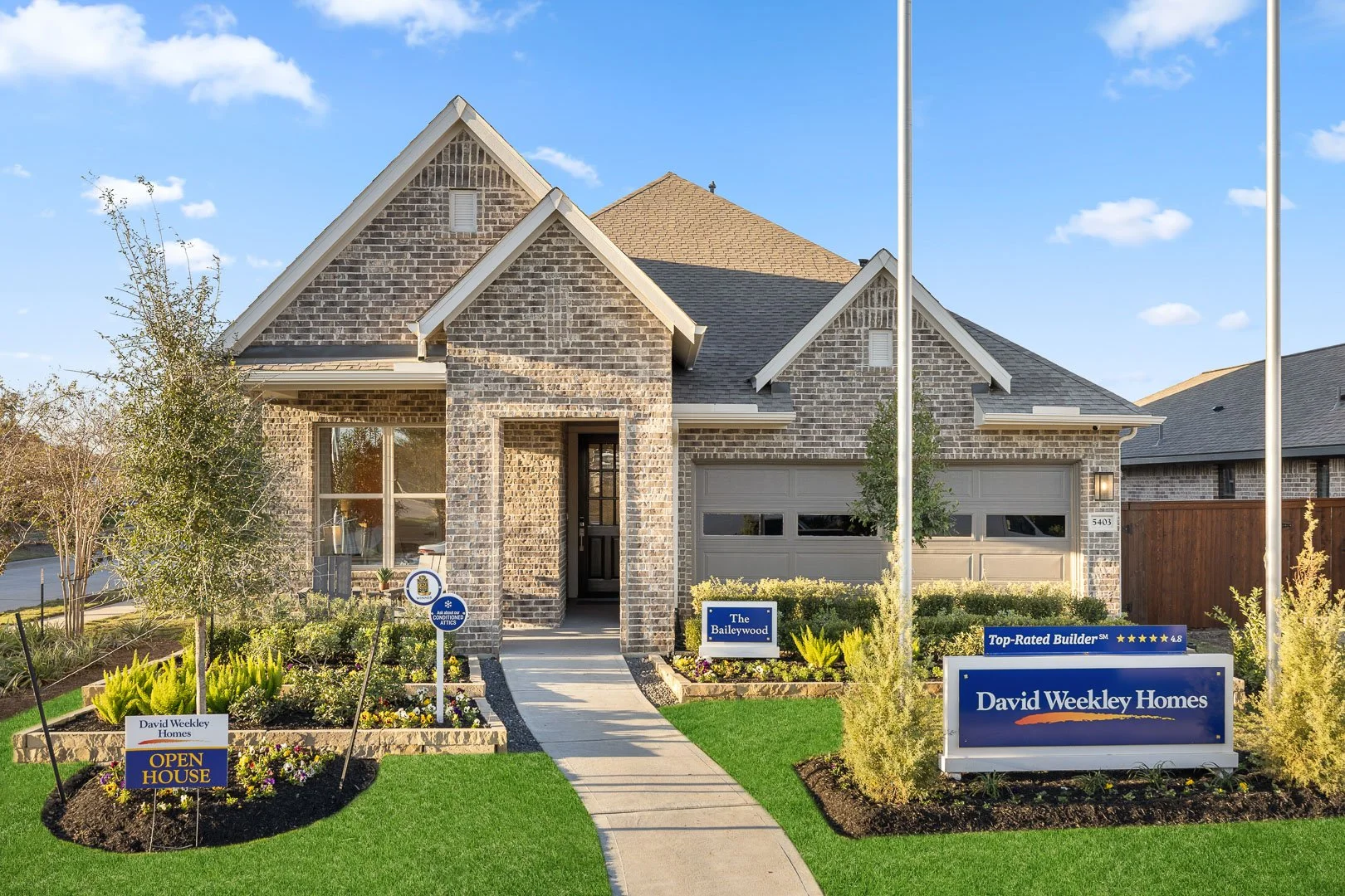 manvel-tx-new-construction-exterior-photography-luxury-model-home-build-on-your-own-lot.jpg