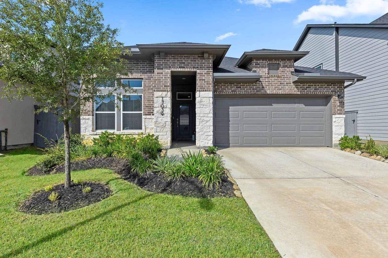 hockley-tx-jubilee-new-construction-home-exterior-real-estate-photography.jpg