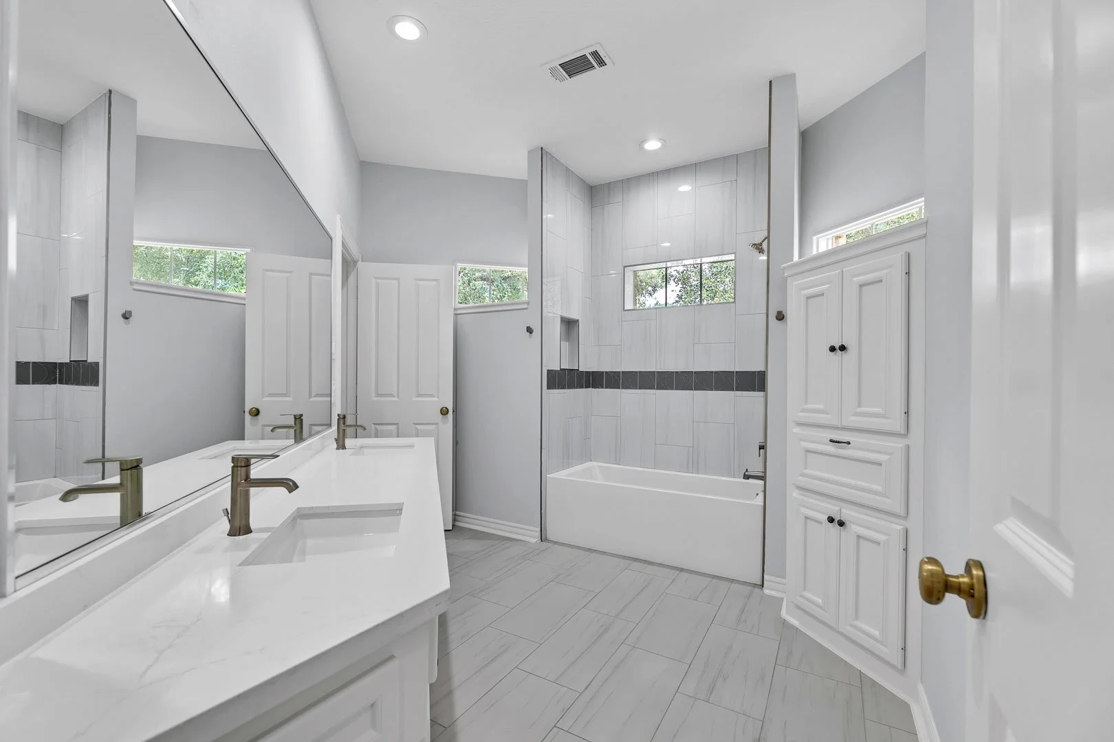montgomery-tx-luxury-secondary-bathroom-large-tile-elegant-new-construction-bathroom-lease--ready.jpg