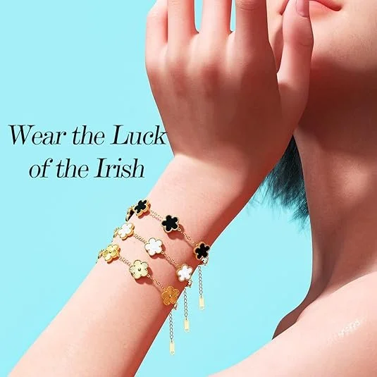 Close-up of a woman wearing gold and black clover-shaped bracelets with a blue background and the text "Wear the Luck of the Irish."