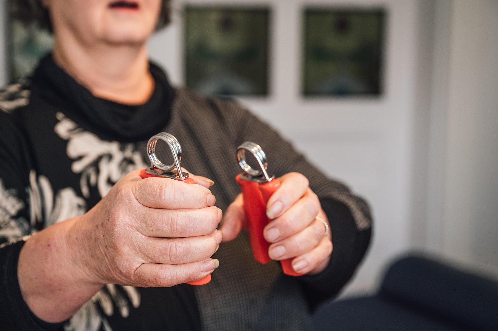 photo of occupational therapy with adult. Building strength.Total Health Orange