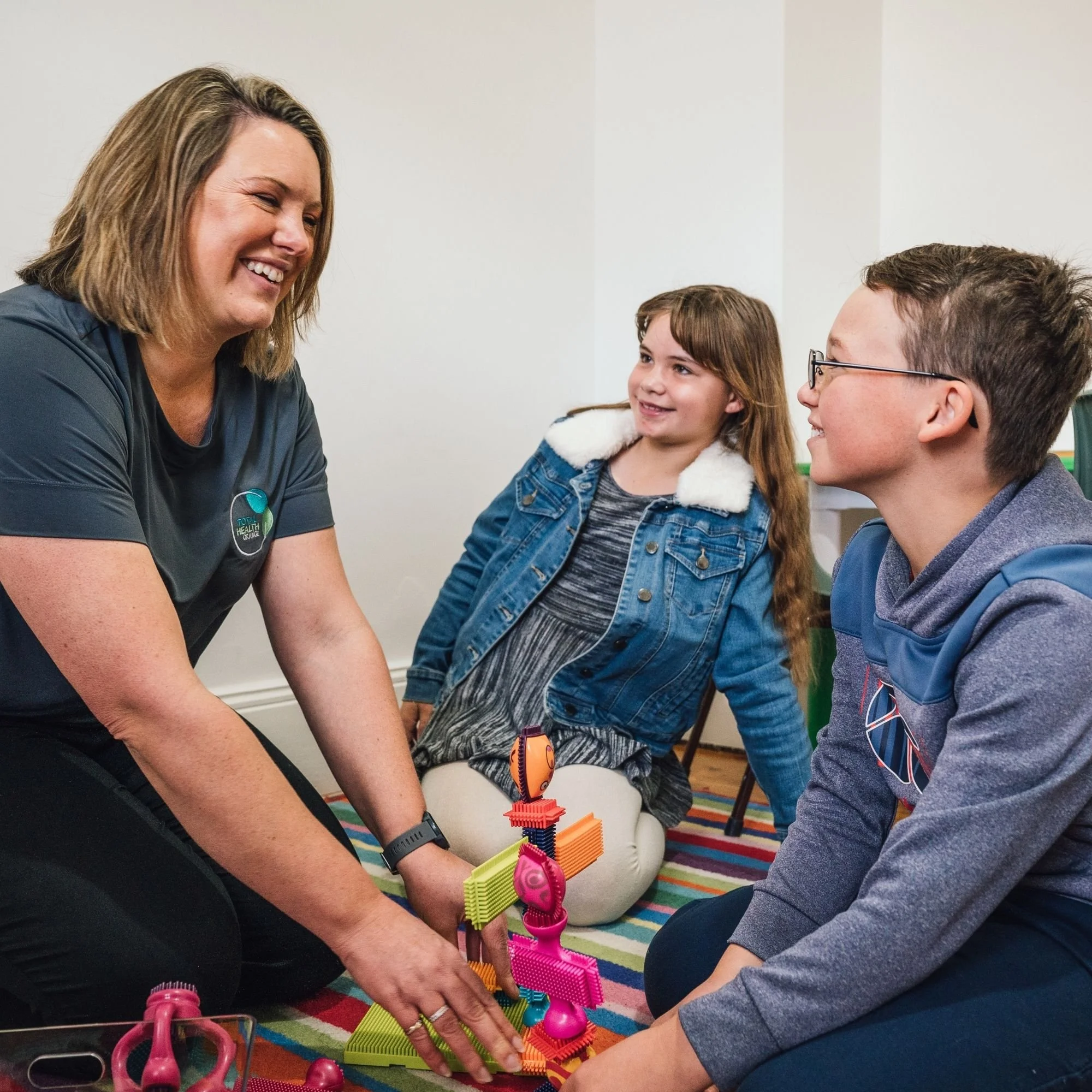 Play-based occupational therapy activity supporting regulation and attention.jpg