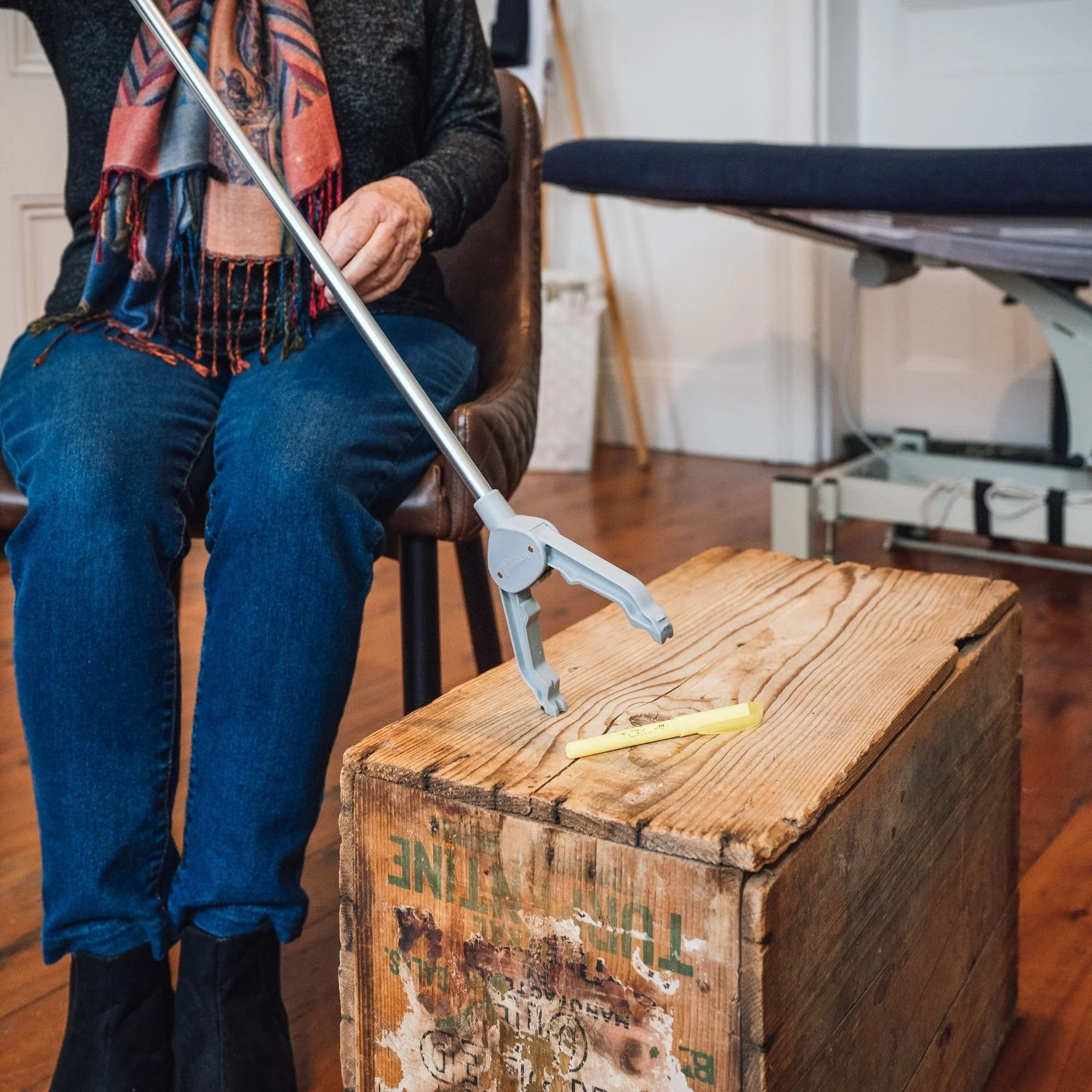 Hands practising daily living skills using a household too.jpg