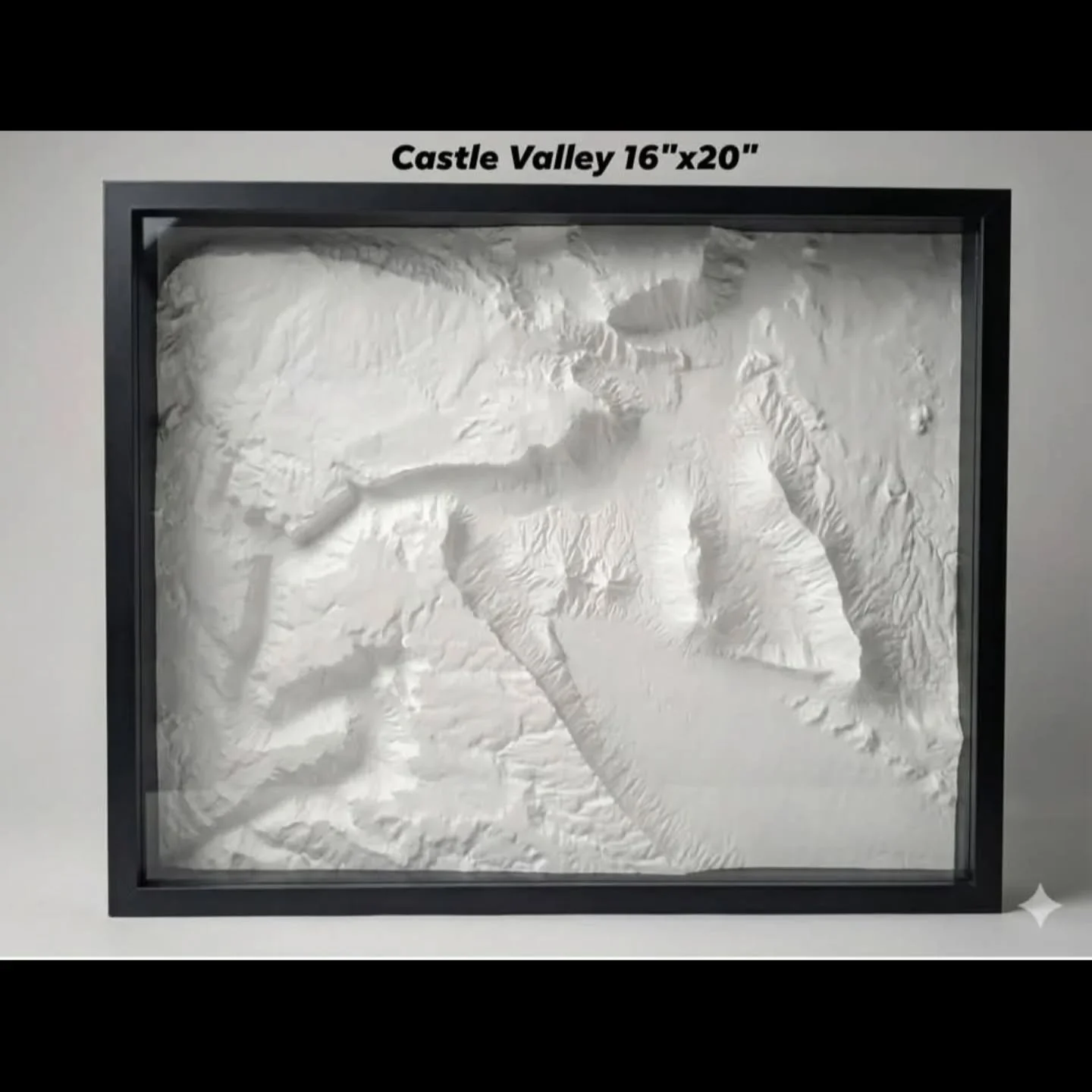 Castle Valley 16&rdquo;&times;20&rdquo; (shadow box, glass) &mdash; This is the desert at its most dramatic. Scaled up to a substantial 16x20, this statement piece captures the surreal, cinematic landscape of Castle Valley in incredible depth. The re