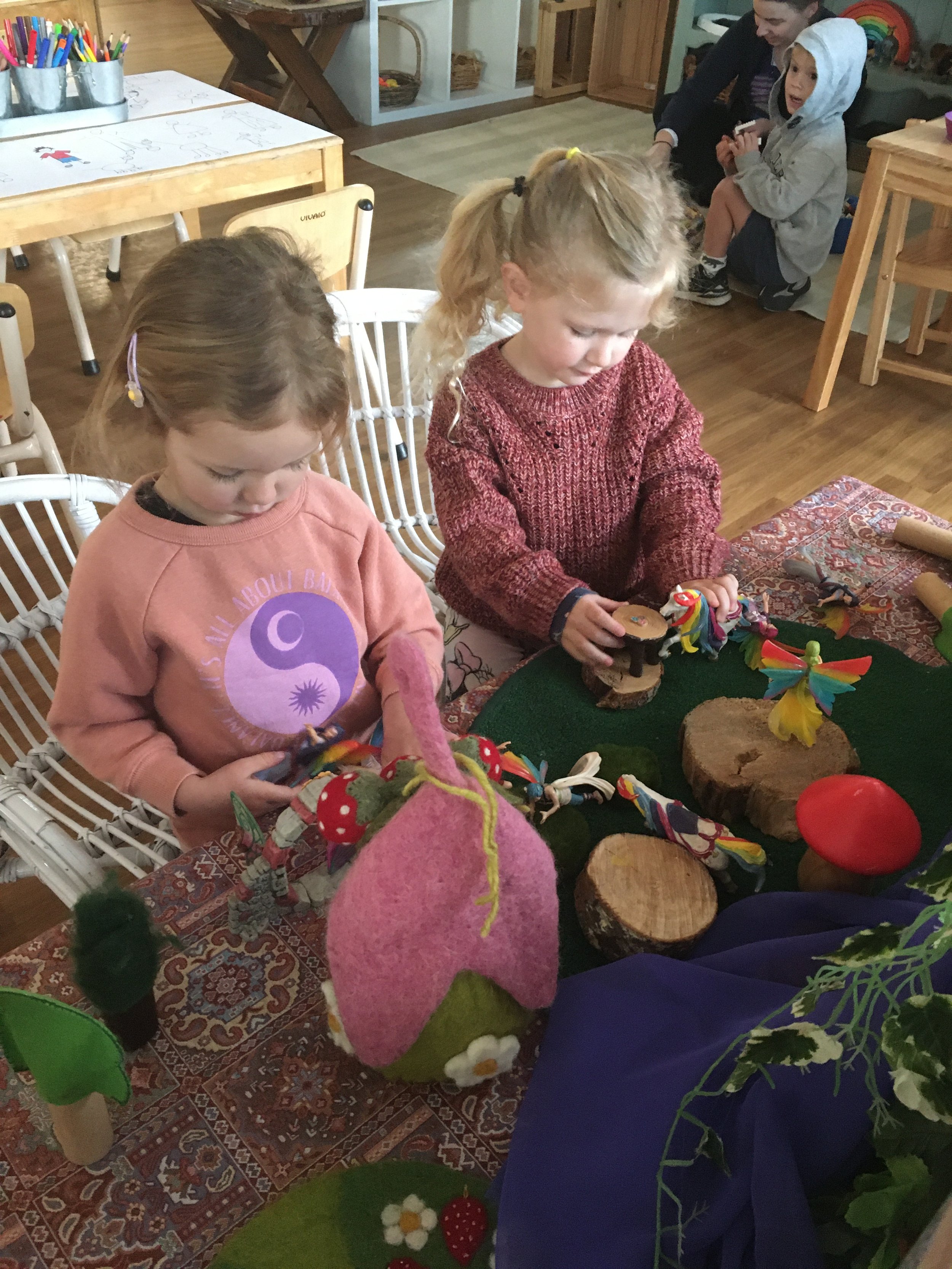 Children engaged in imaginative small-world play at South West Rocks Preschool.