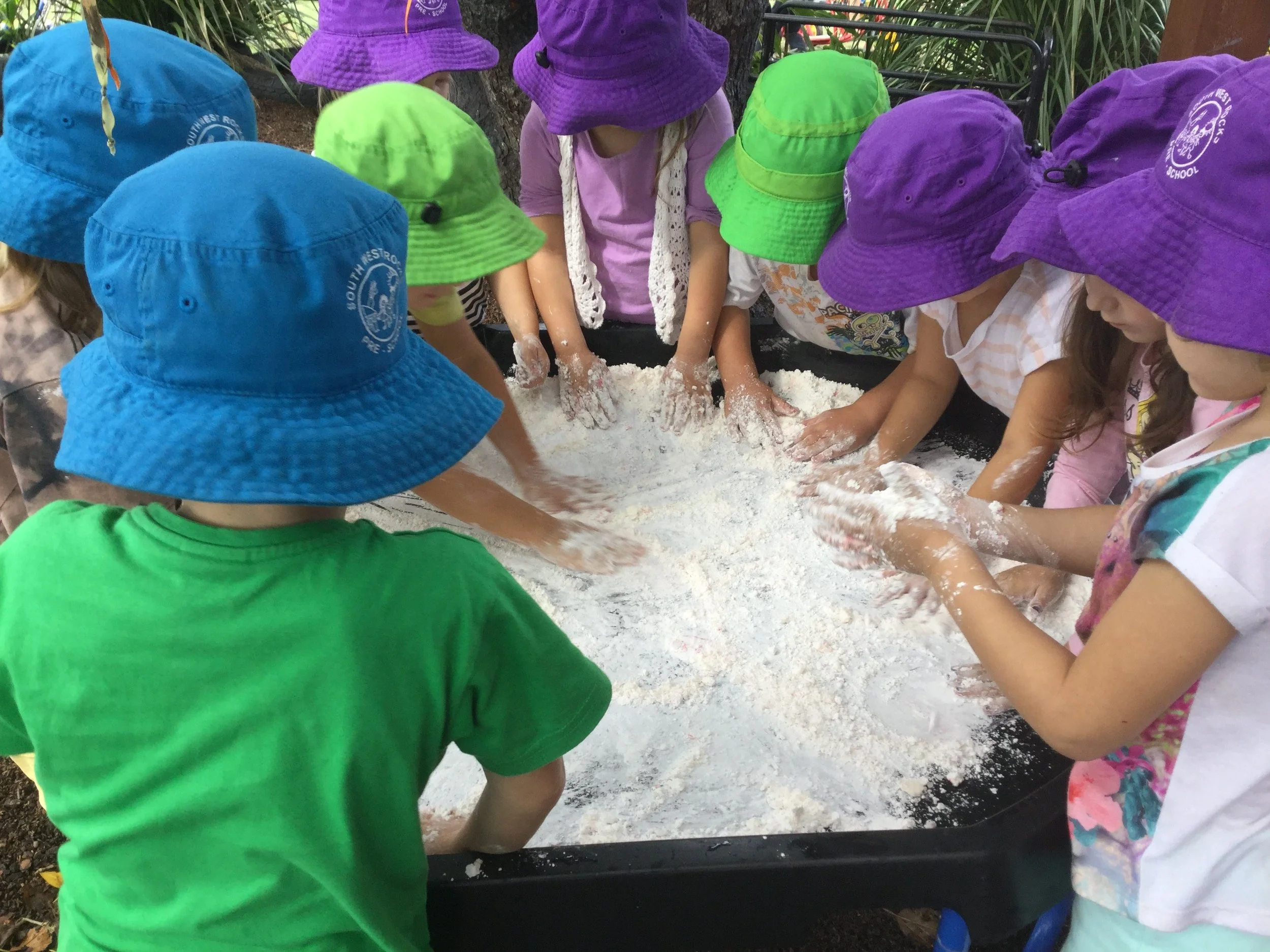 Children participating in a sensory play experience at South West Rocks Preschool.