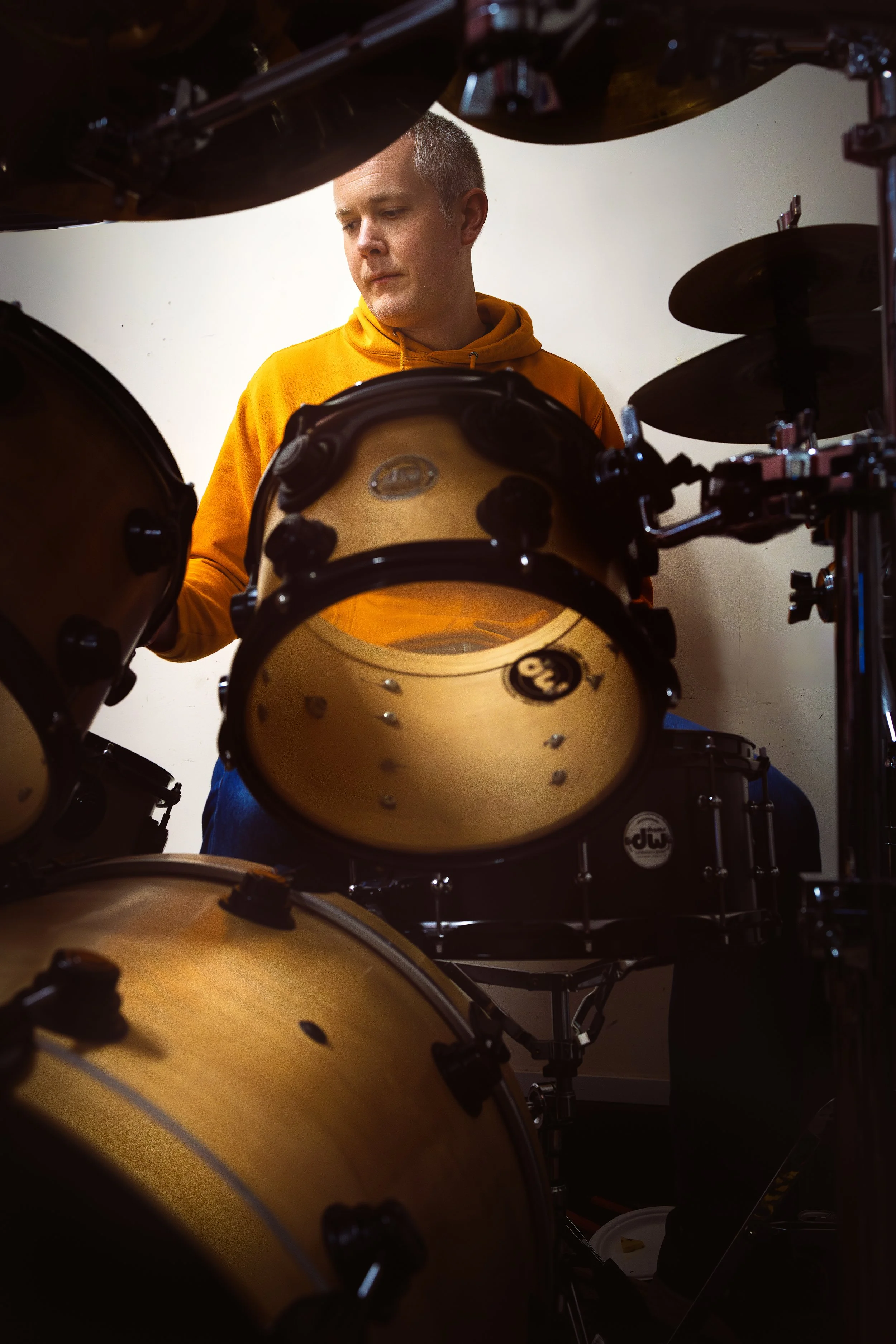 A close-up colour shot of session drummer Simon Barbour in the studio