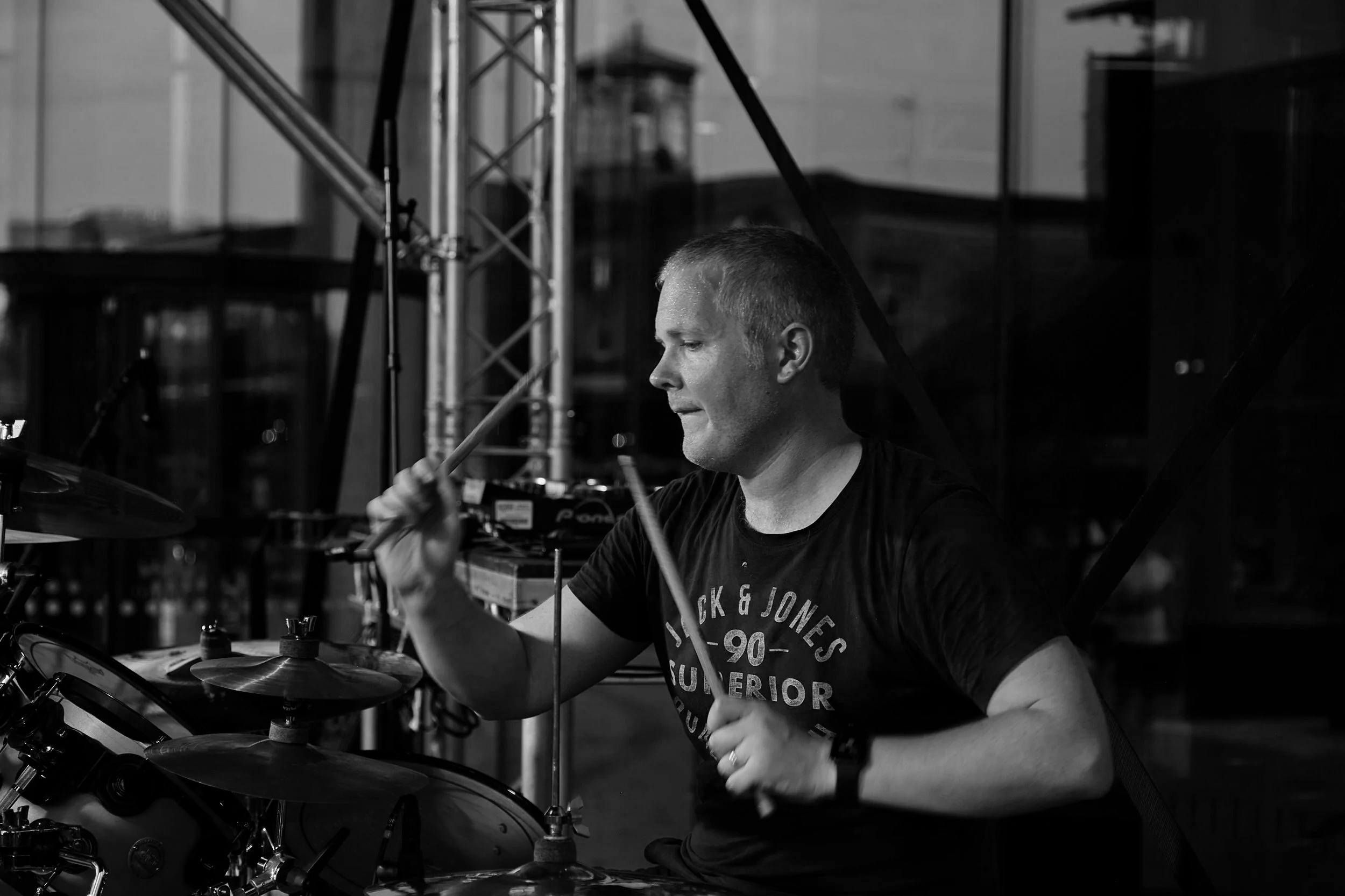 Session drummer Simon Barbour performing on-stage at the opening of One Station Hill, Reading