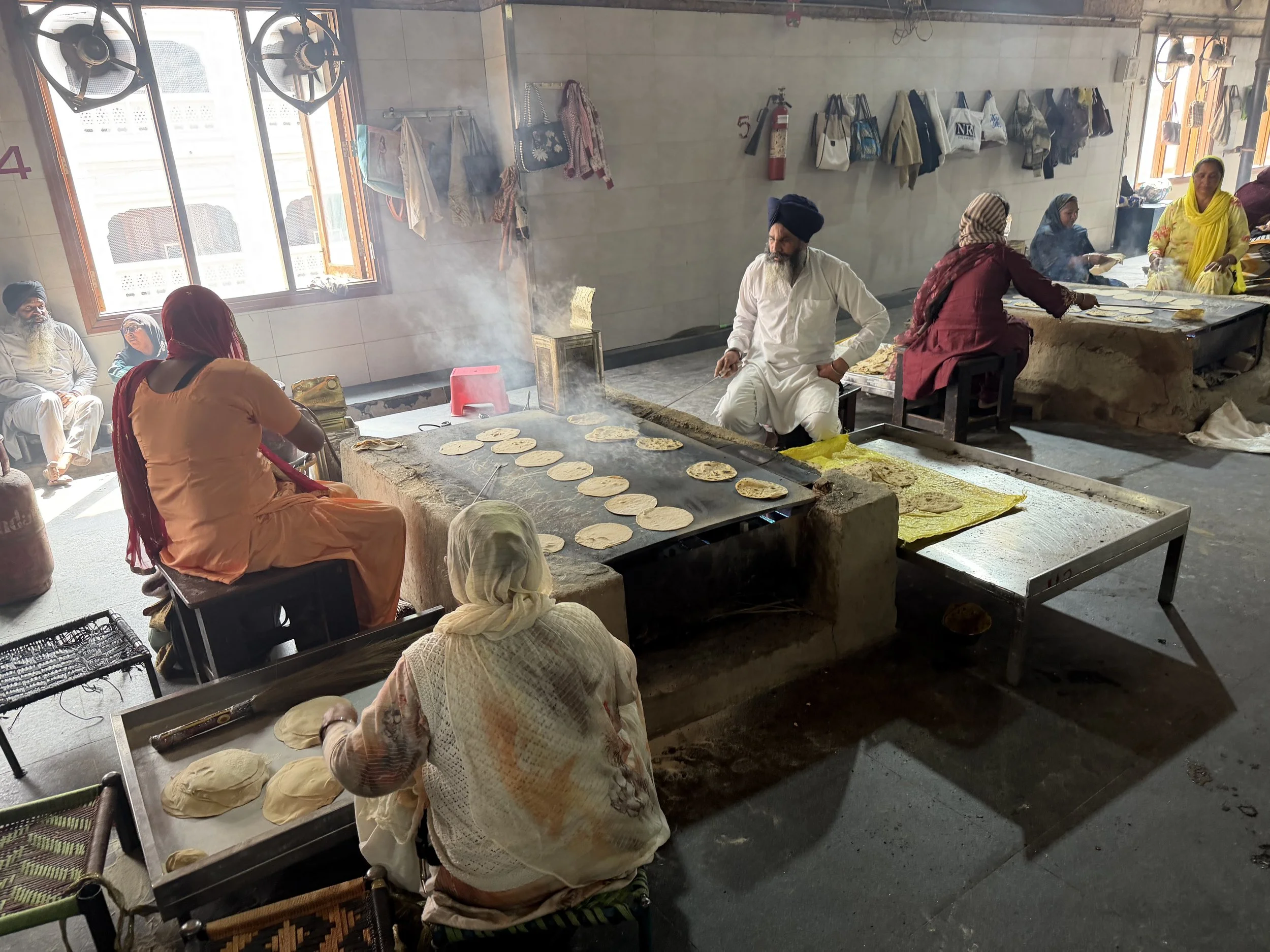 Volunteers preparing food in the langar kitchen at the Golden Temple
