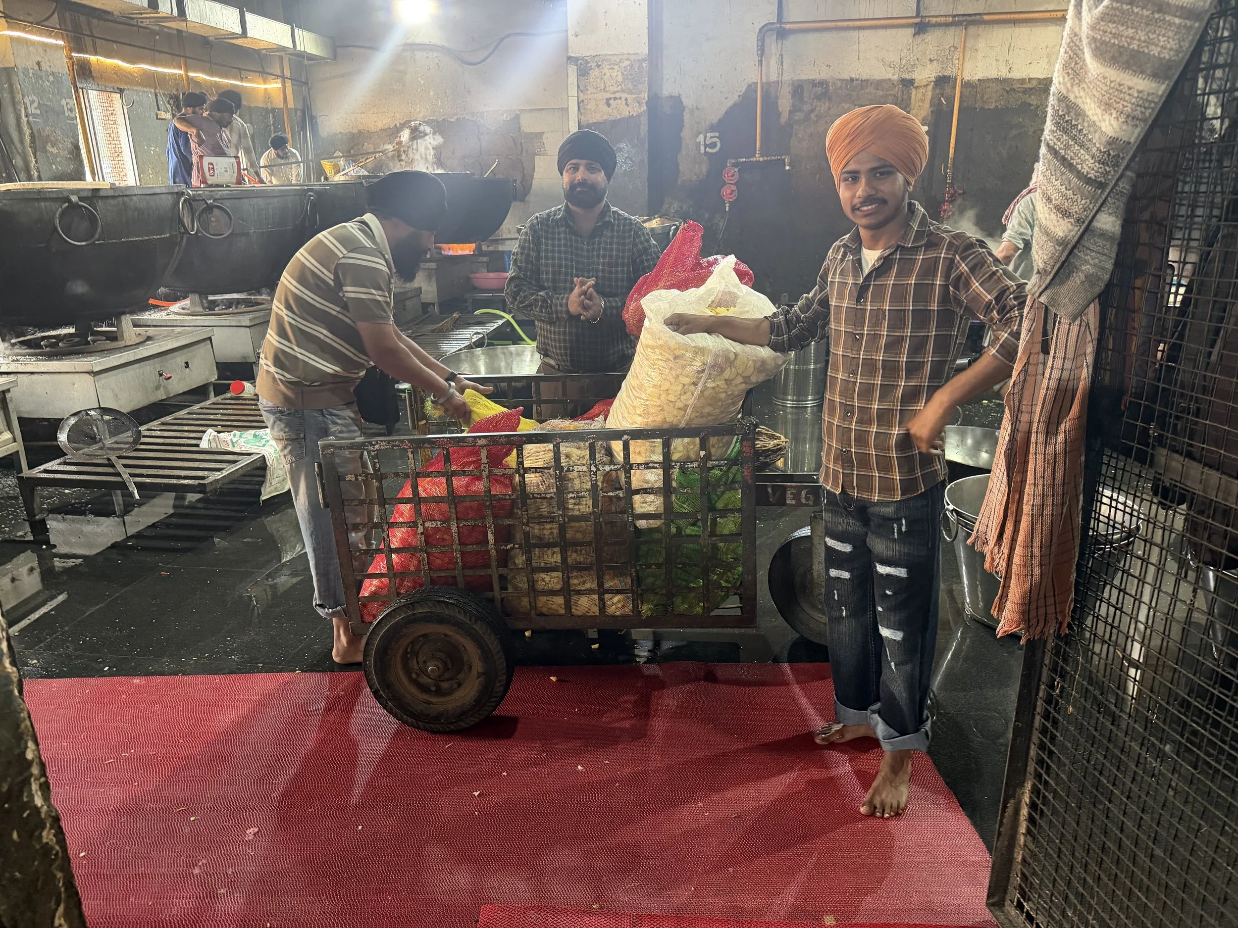 Volunteers preparing food in the langar kitchen at the Golden Temple