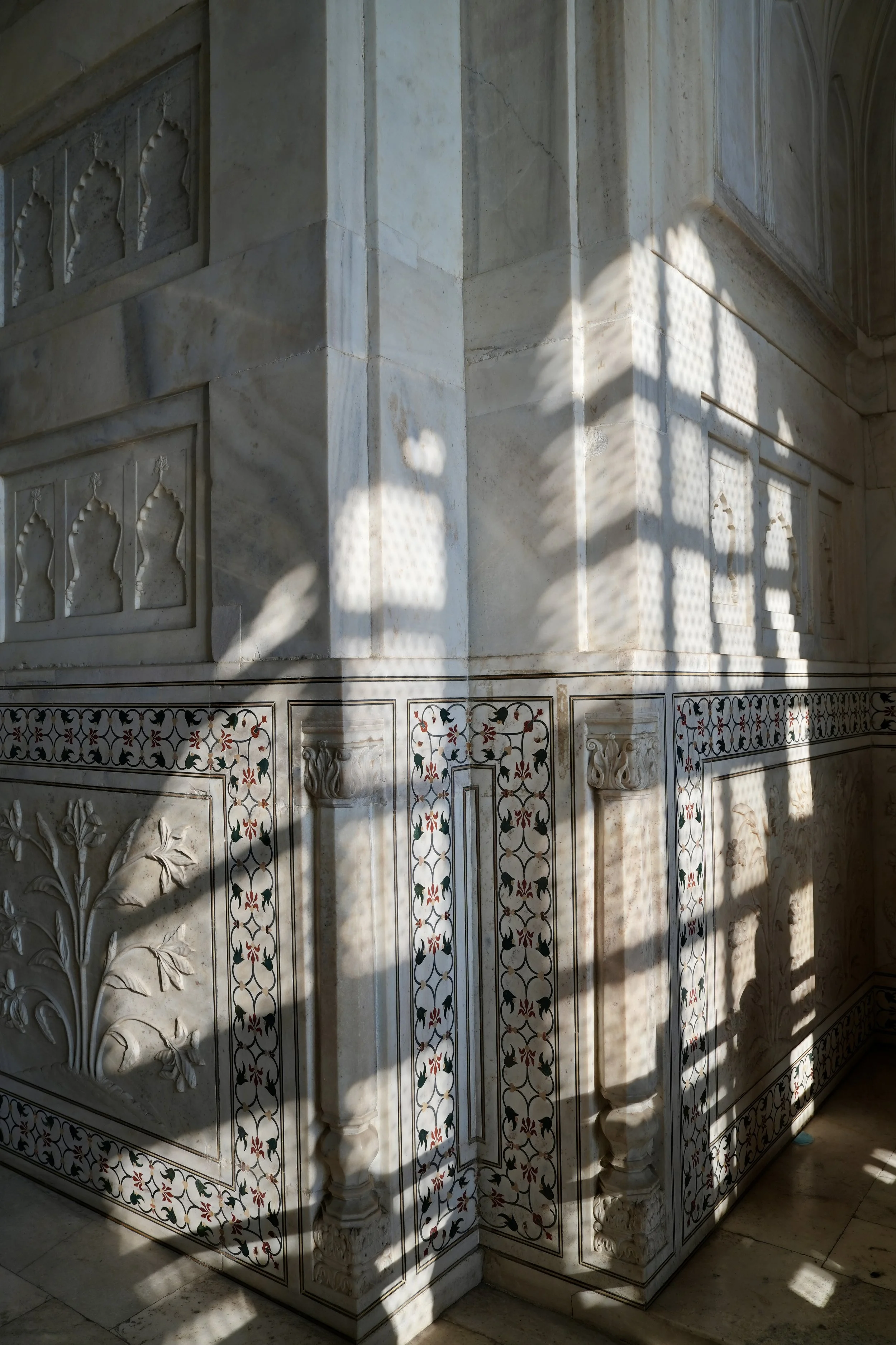 shadows from Carved marble screen inside the Taj Mahal mausoleum