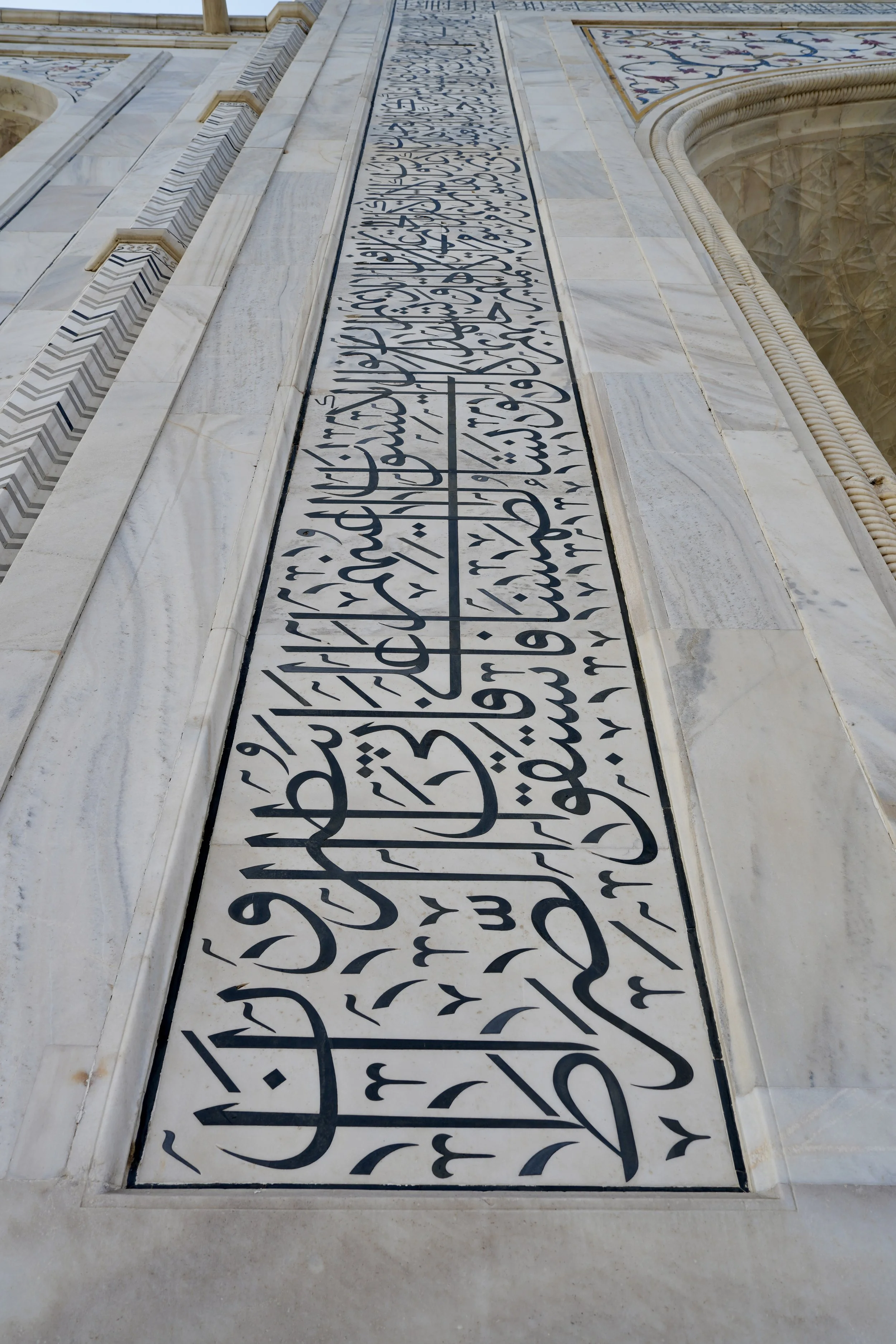 Close-up of marble inlay detail on the Taj Mahal in Agra